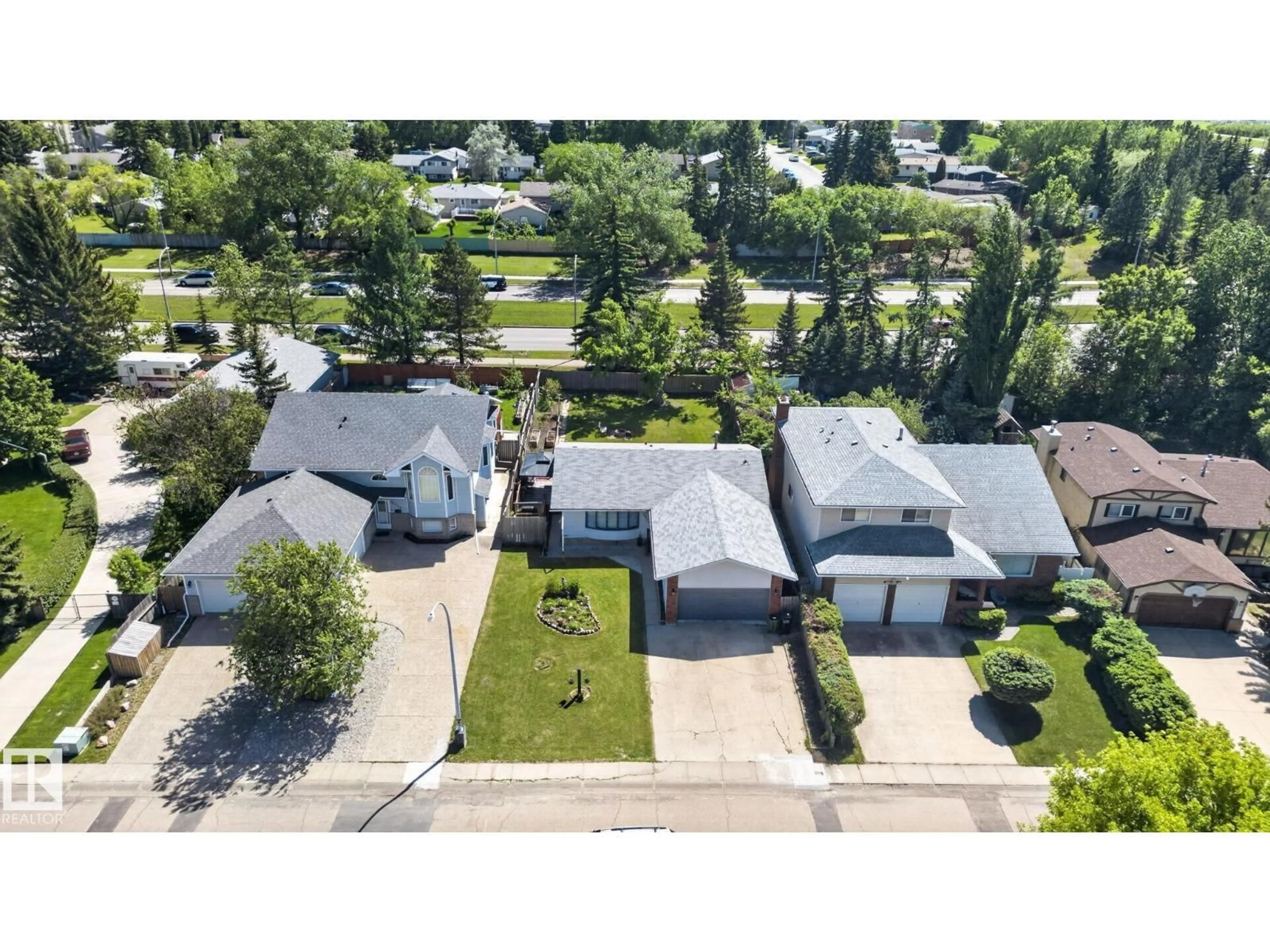 A pic from outside/outdoor area/front of a property/back of a property/a pic from drone, street for 8807 24 AV, Edmonton Alberta T6W2W3