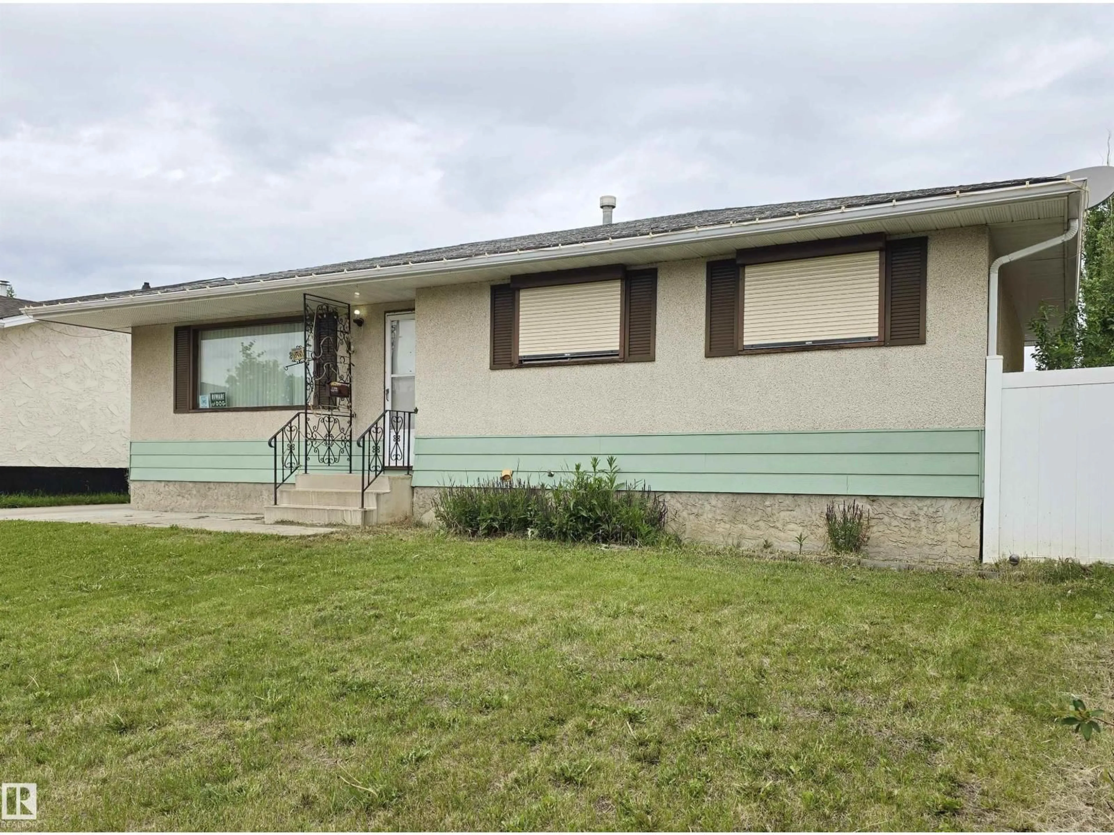 Home with vinyl exterior material, building for NW - 3718 136A AV, Edmonton Alberta T5A2P4