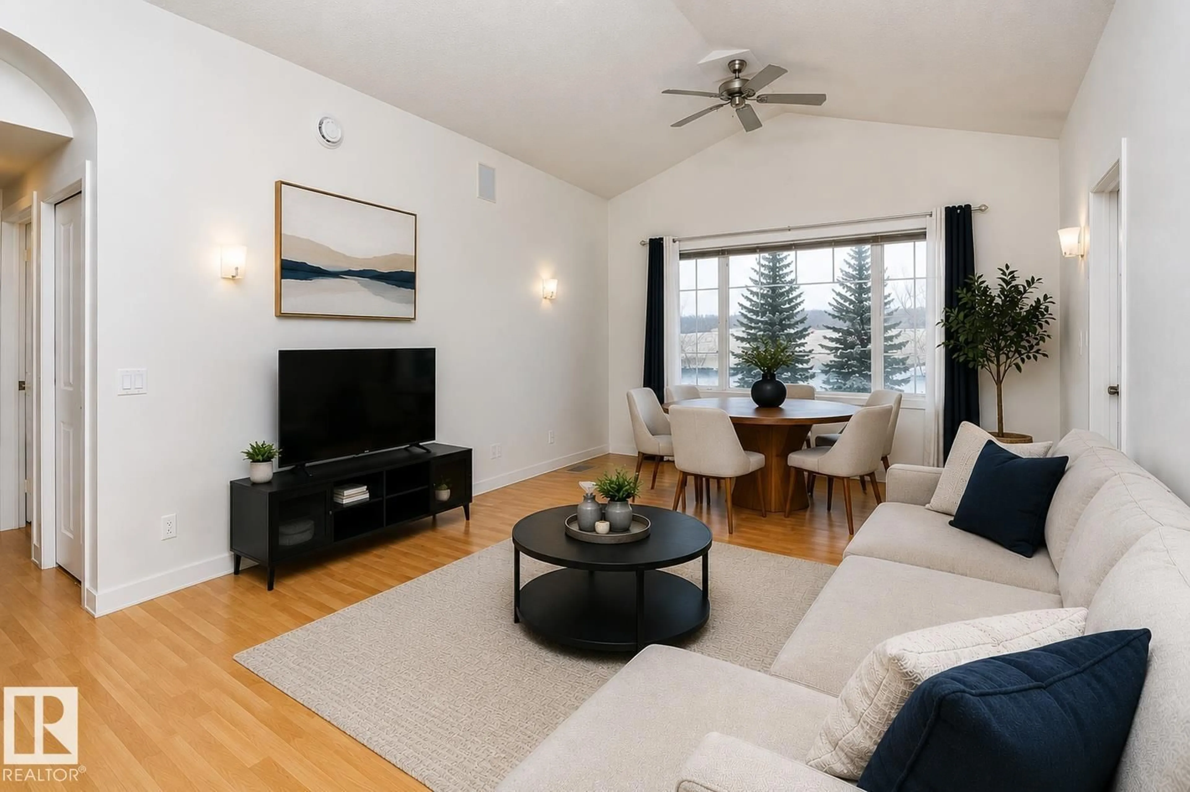 Living room with furniture, wood/laminate floor for 19 - 2565 HANNA CR, Edmonton Alberta T6R0M4
