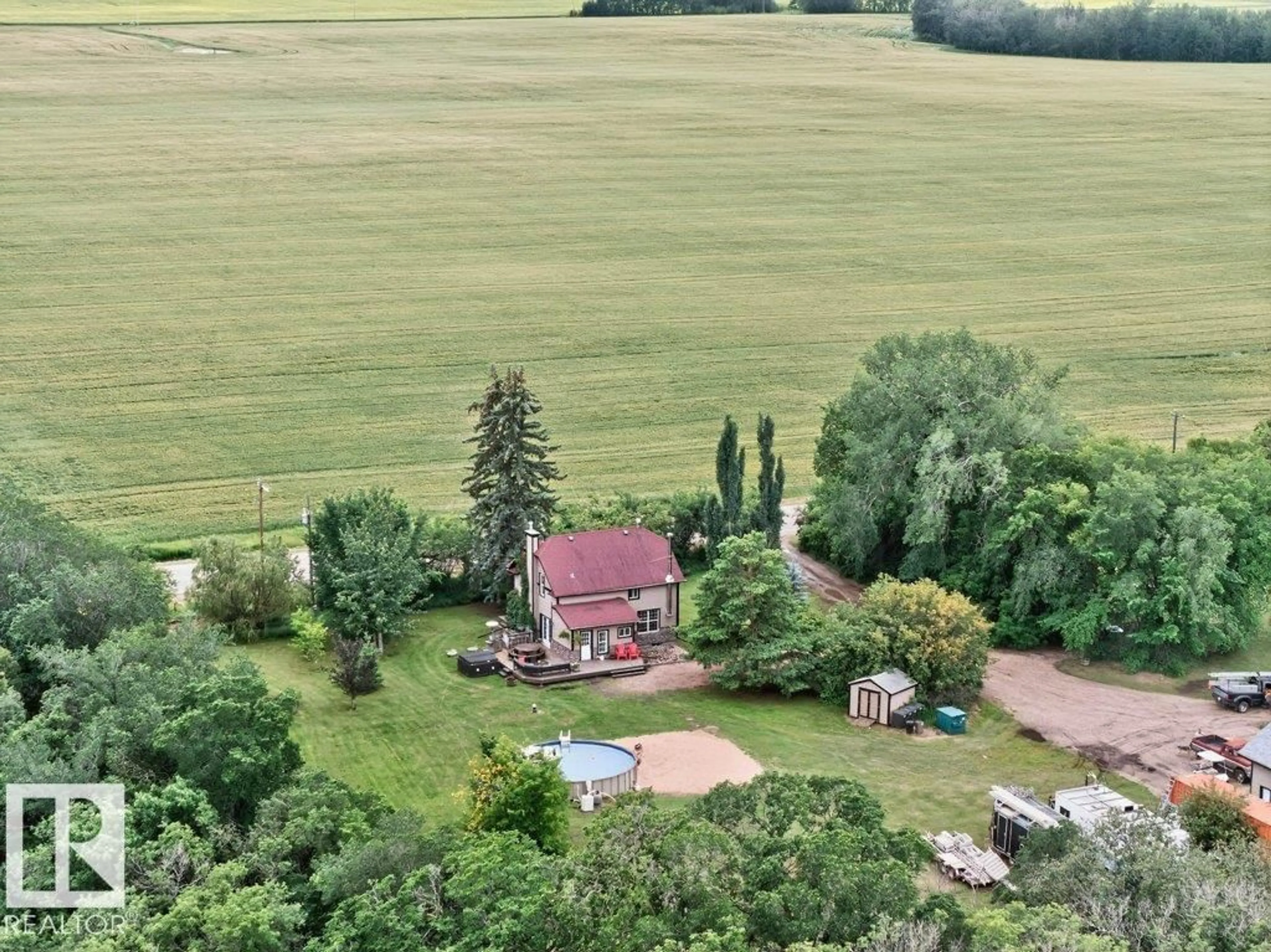 A pic from outside/outdoor area/front of a property/back of a property/a pic from drone, unknown for 26542 TWP 504 RD, Rural Leduc County Alberta T9G0J9