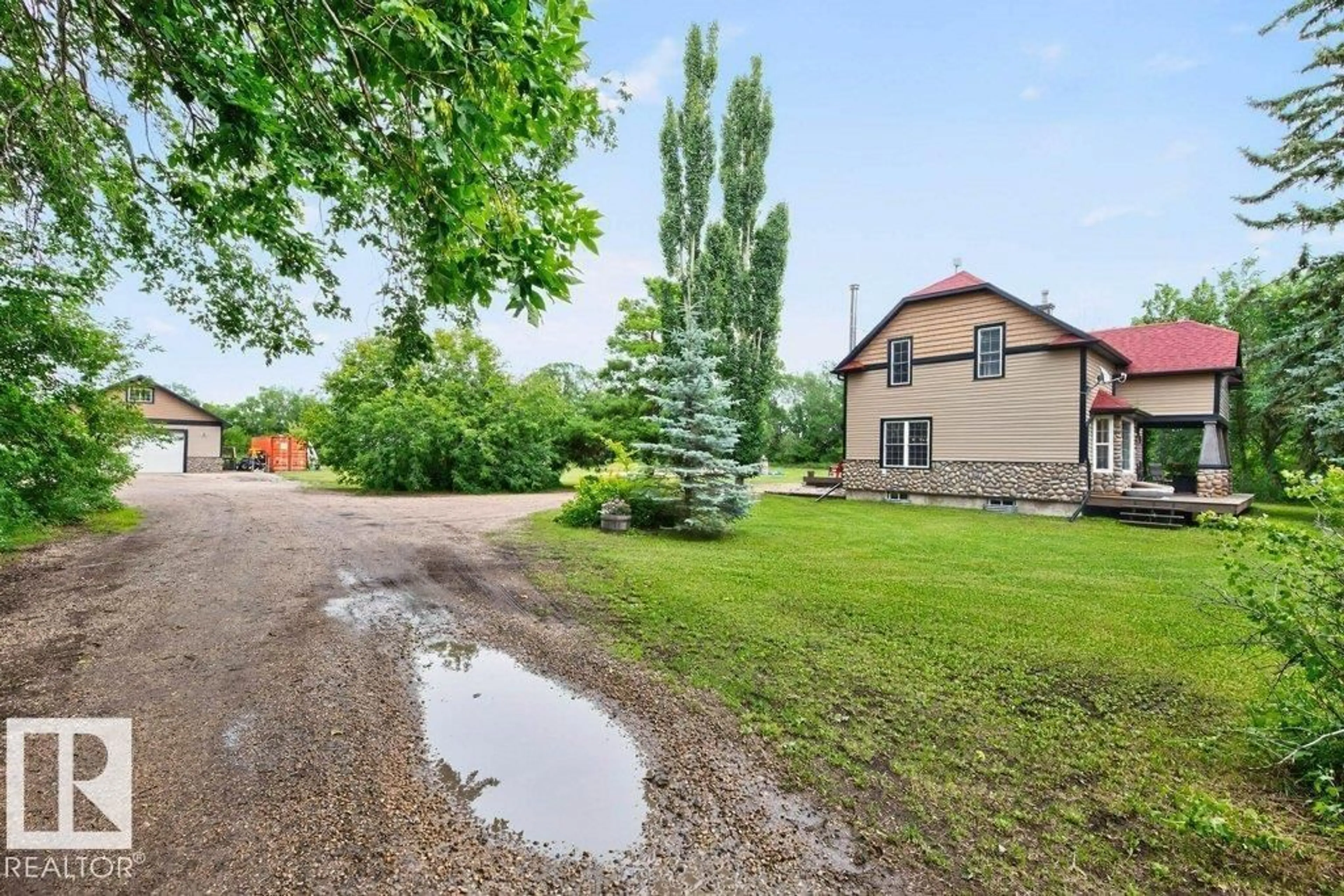 A pic from outside/outdoor area/front of a property/back of a property/a pic from drone, unknown for 26542 TWP 504 RD, Rural Leduc County Alberta T9G0J9