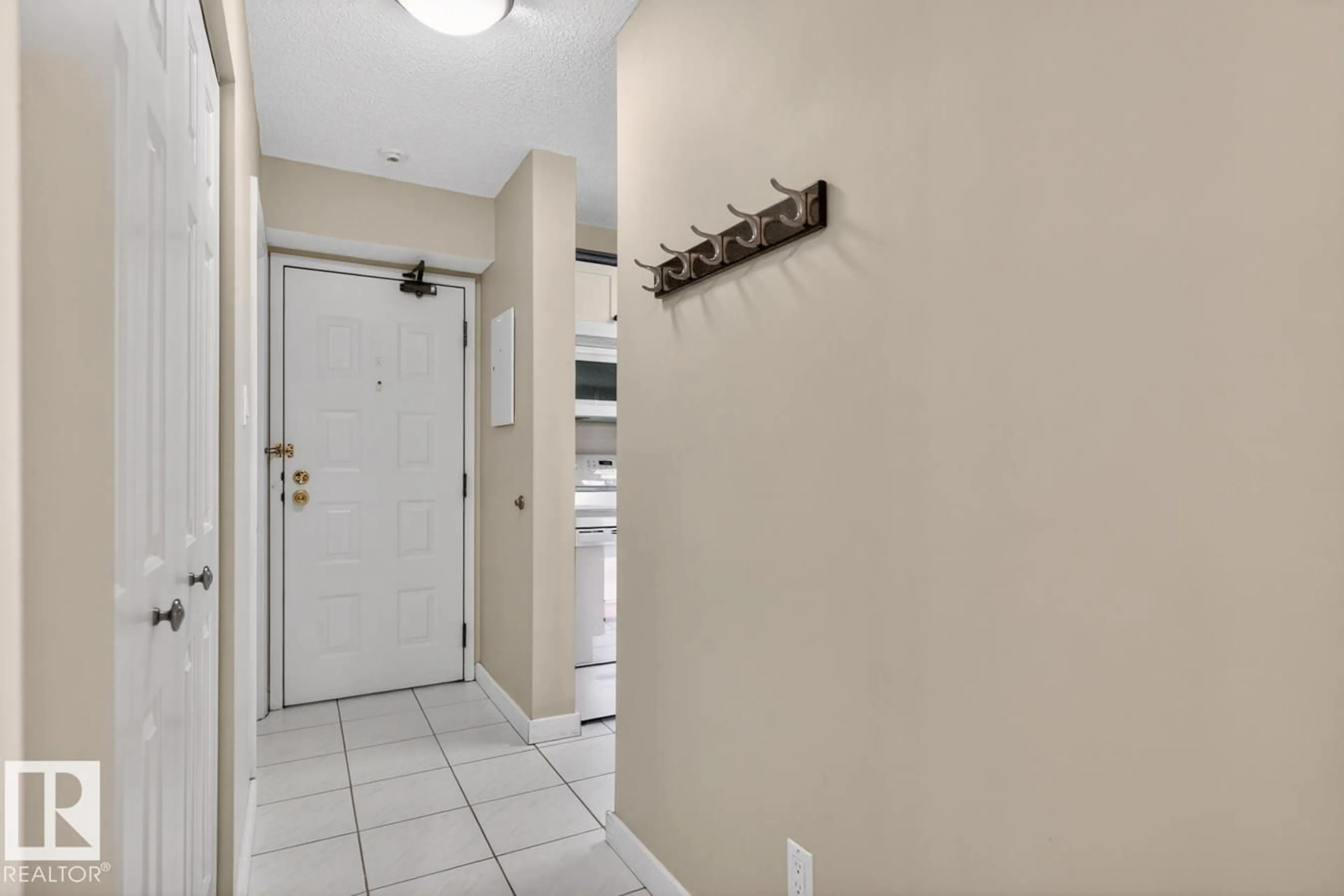 Indoor foyer for #405 - 10545 SASKATCHEWAN DR, Edmonton Alberta T6E6C6