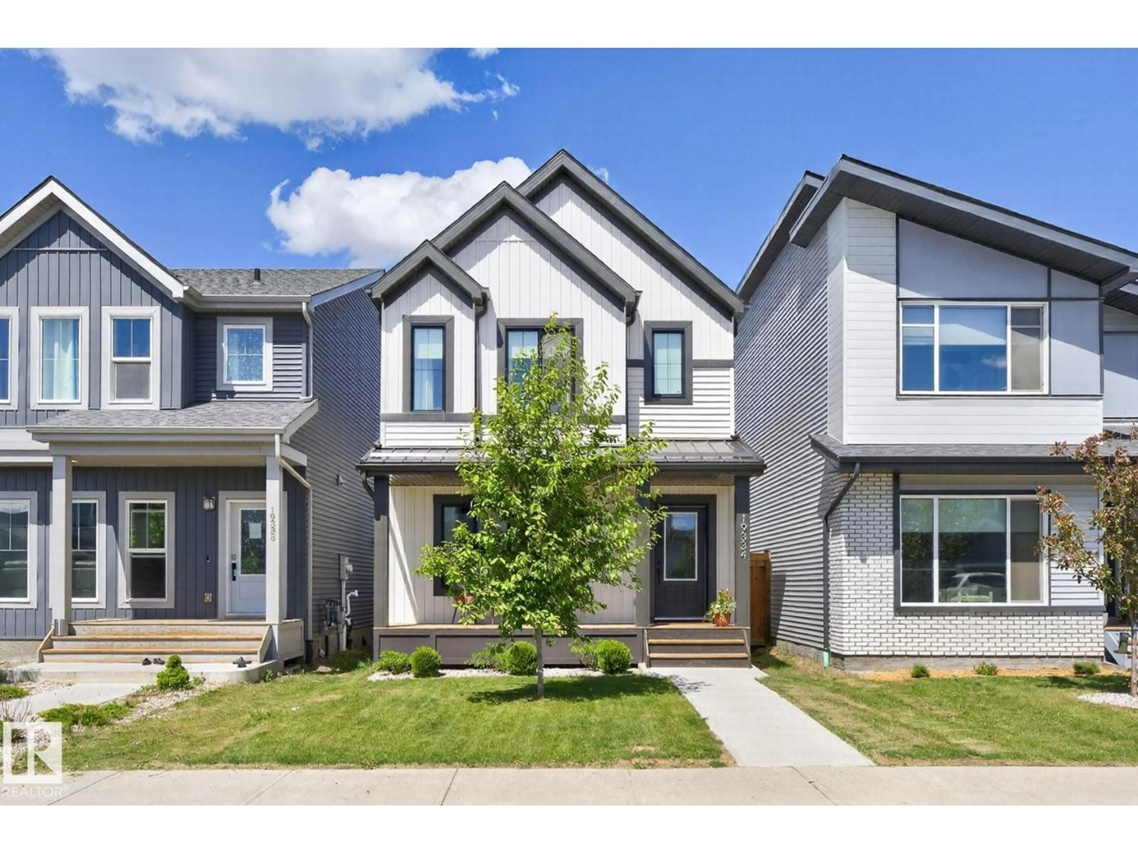 Home with brick exterior material, street for 19334 26A AV, Edmonton Alberta T6M1L2