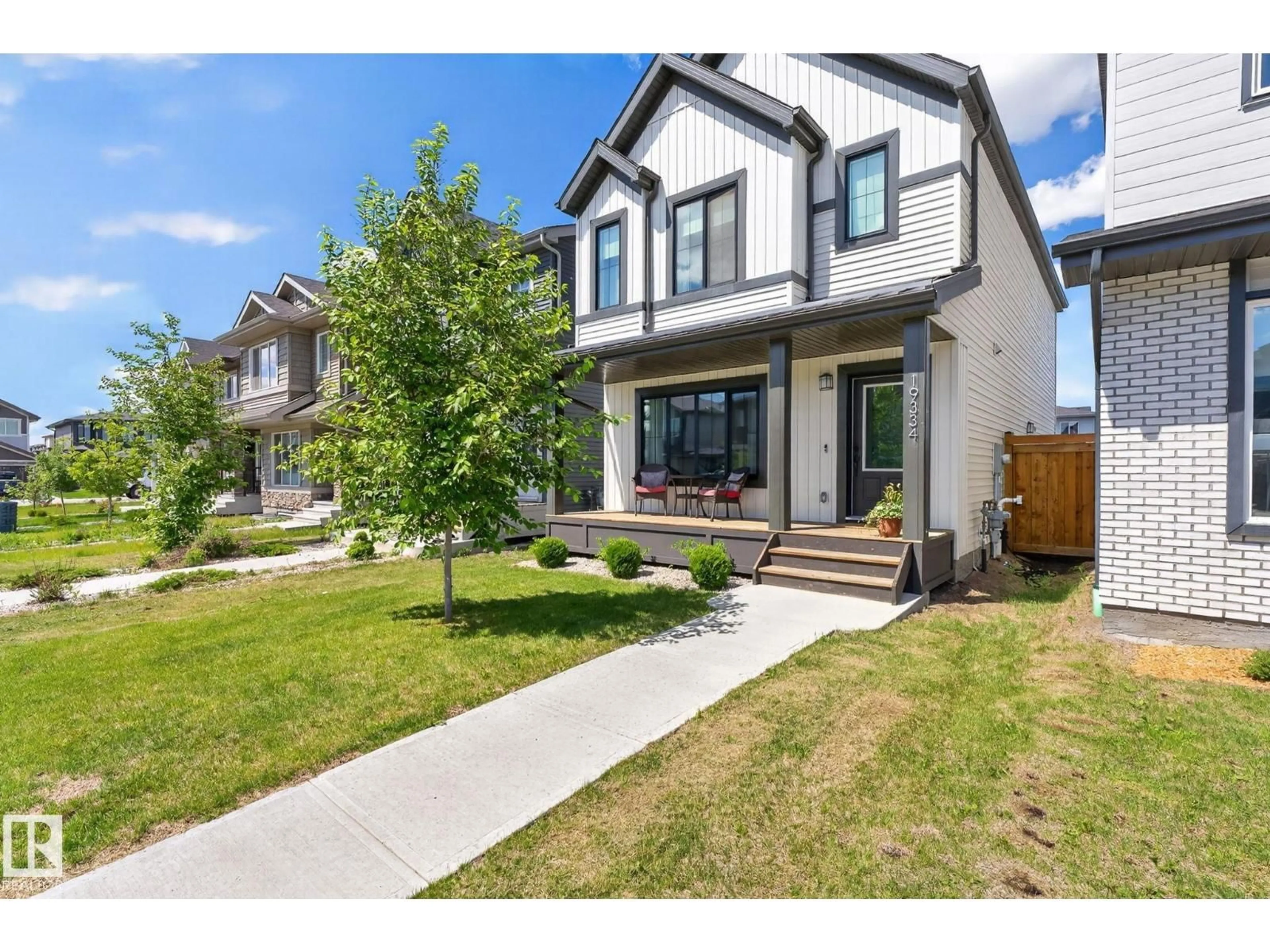 Home with brick exterior material, street for 19334 26A AV, Edmonton Alberta T6M1L2