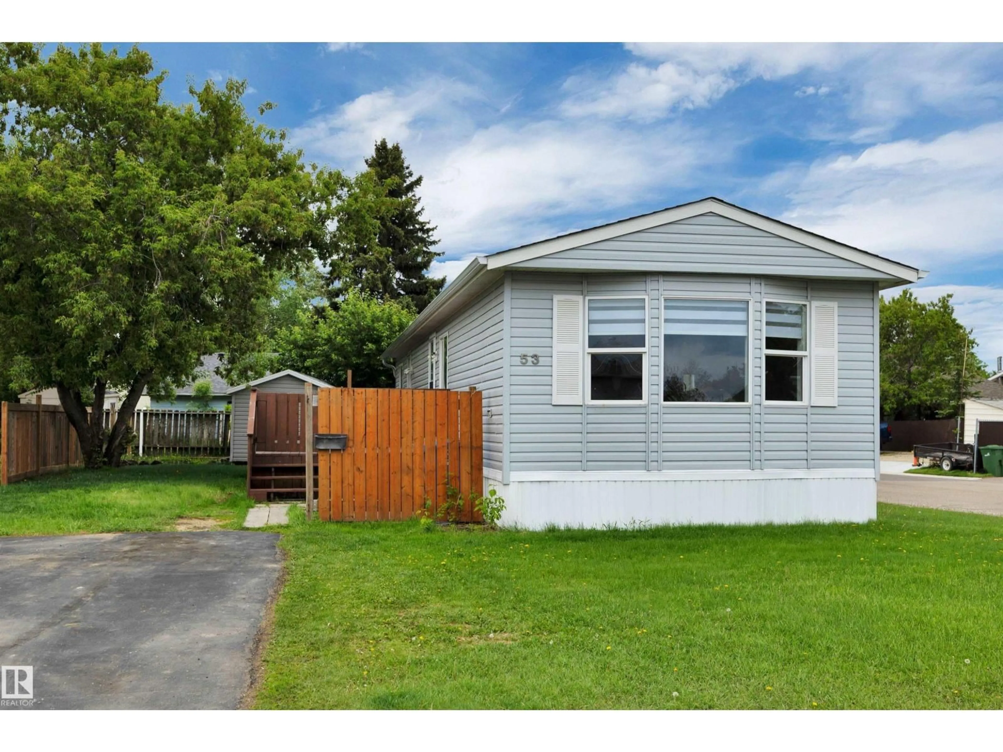Home with vinyl exterior material, street for 53 WILLOW PARK ES, Leduc Alberta T9E5R3
