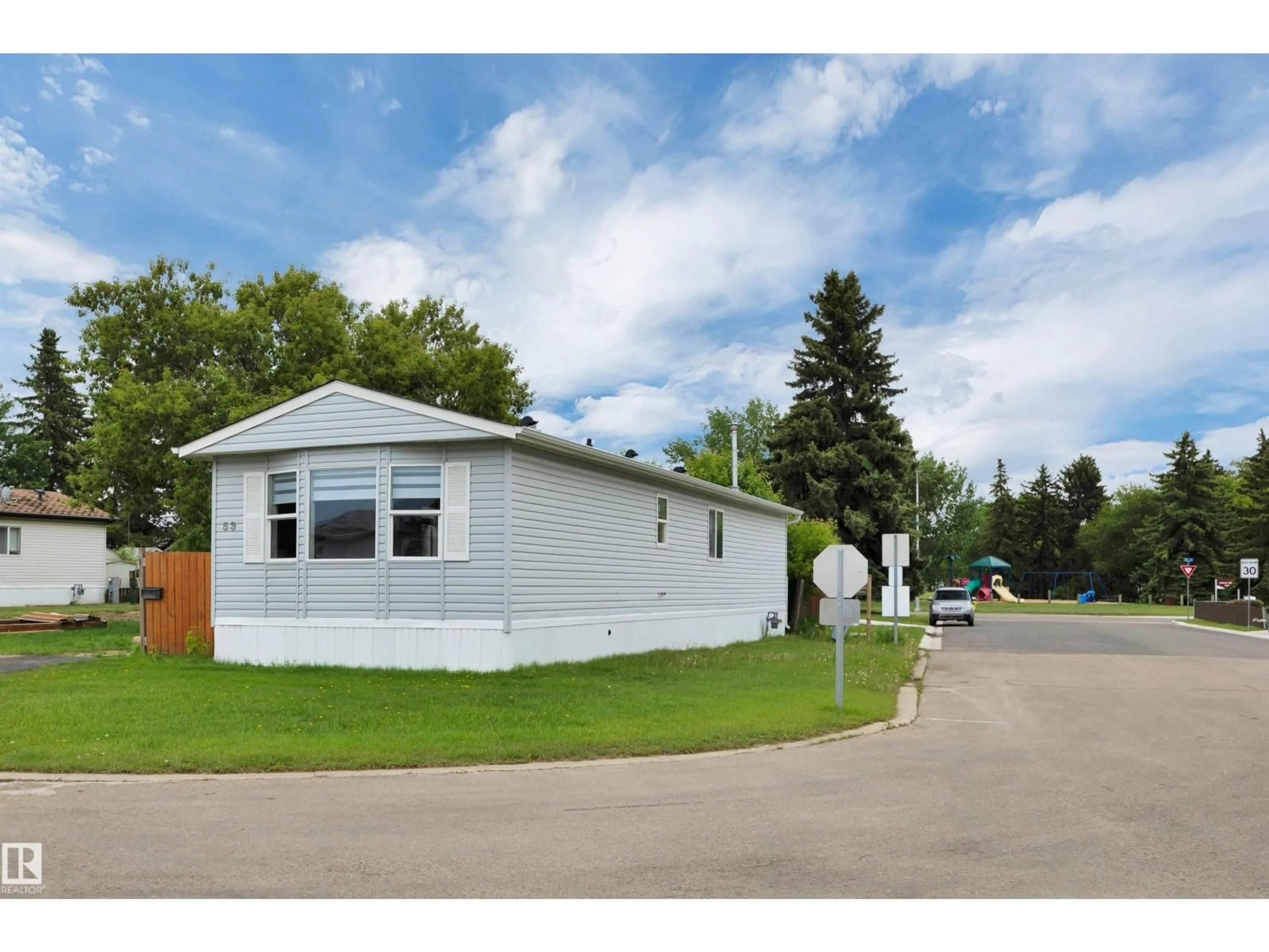 Home with vinyl exterior material, street for 53 WILLOW PARK ES, Leduc Alberta T9E5R3