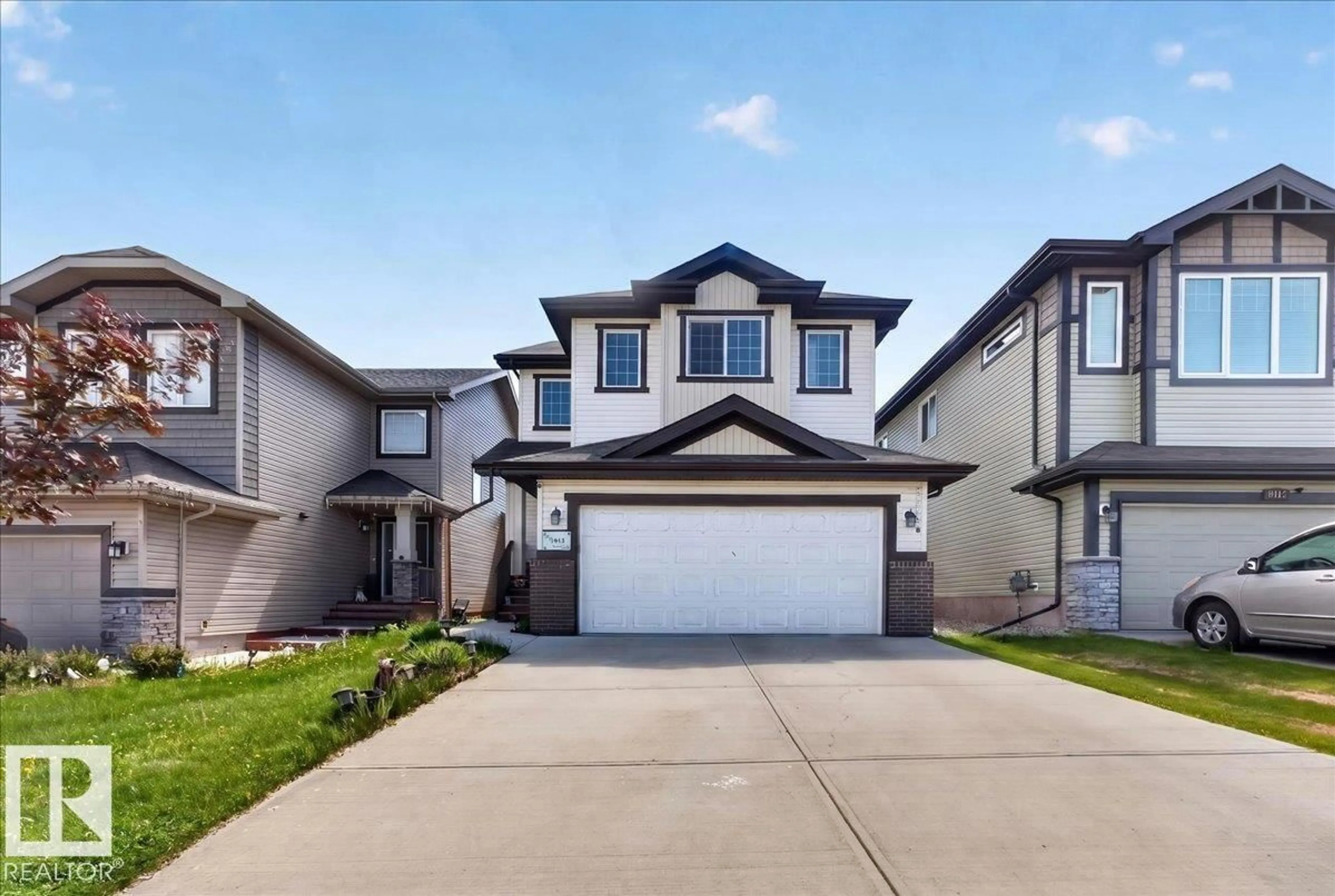 Home with vinyl exterior material, street for 1411 30 AV, Edmonton Alberta T6T0V7