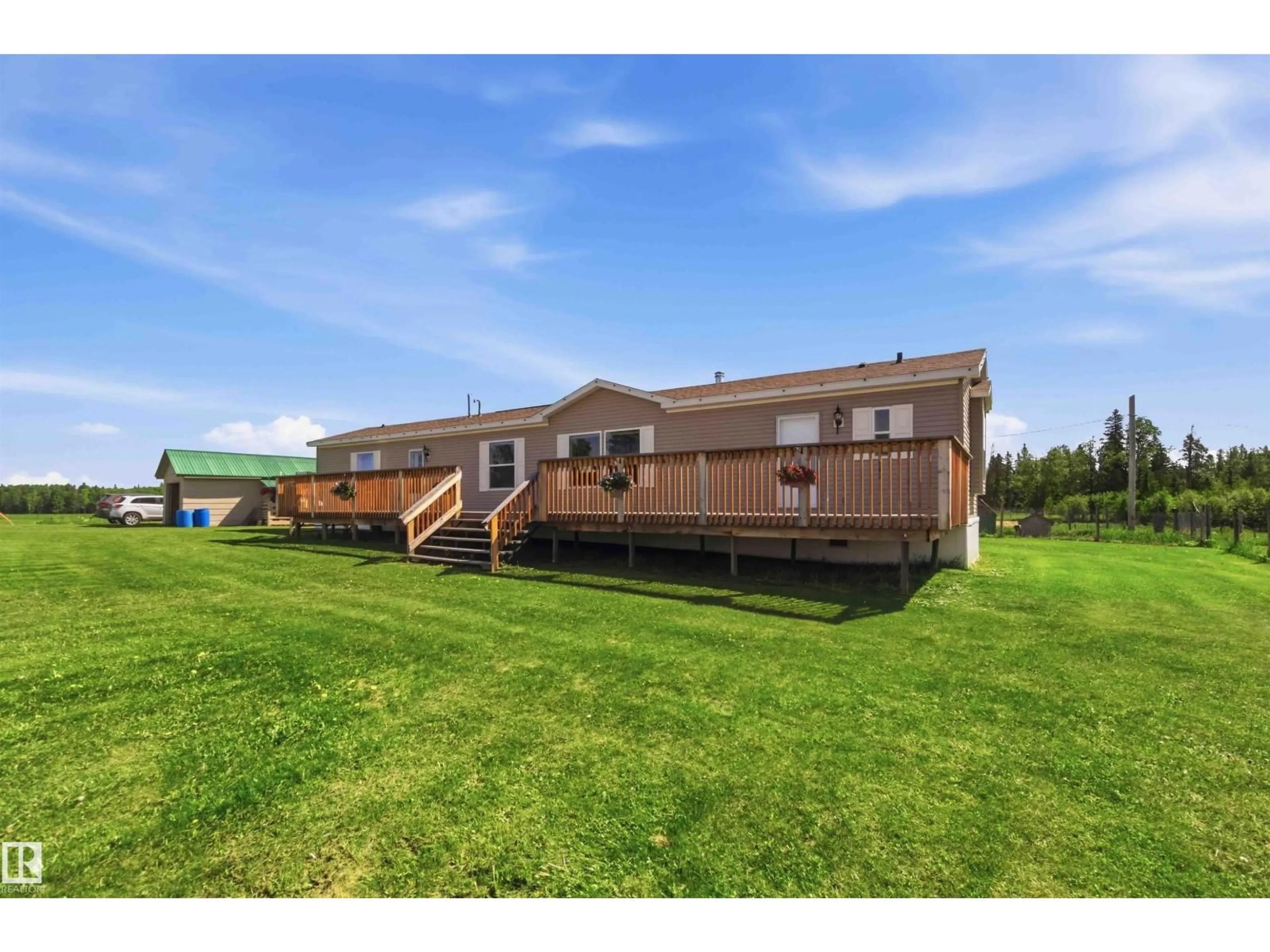 A pic from outside/outdoor area/front of a property/back of a property/a pic from drone, water/lake/river/ocean view for 55213 RGE ROAD 62, Rural Lac Ste. Anne County Alberta T0E2A0