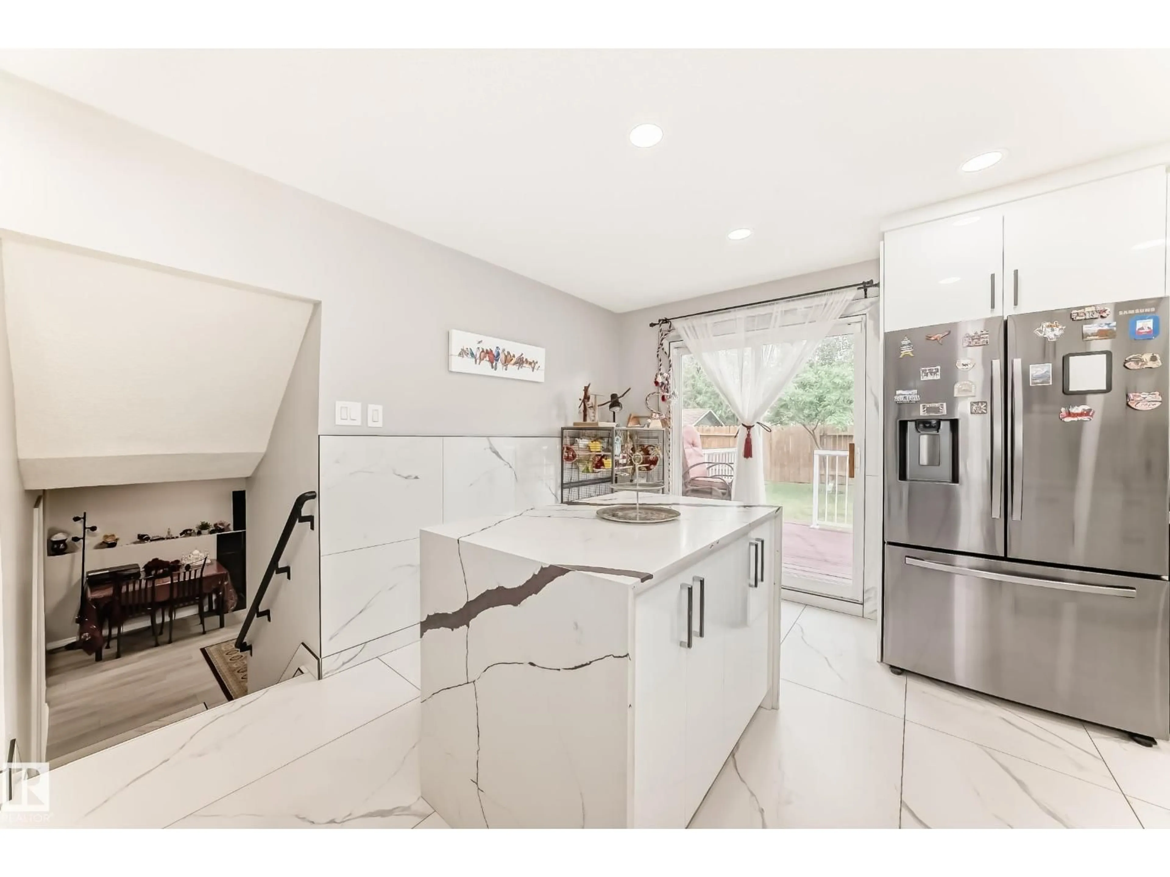 Open concept kitchen, ceramic/tile floor for 3843 47 ST, Edmonton Alberta T6L5B3