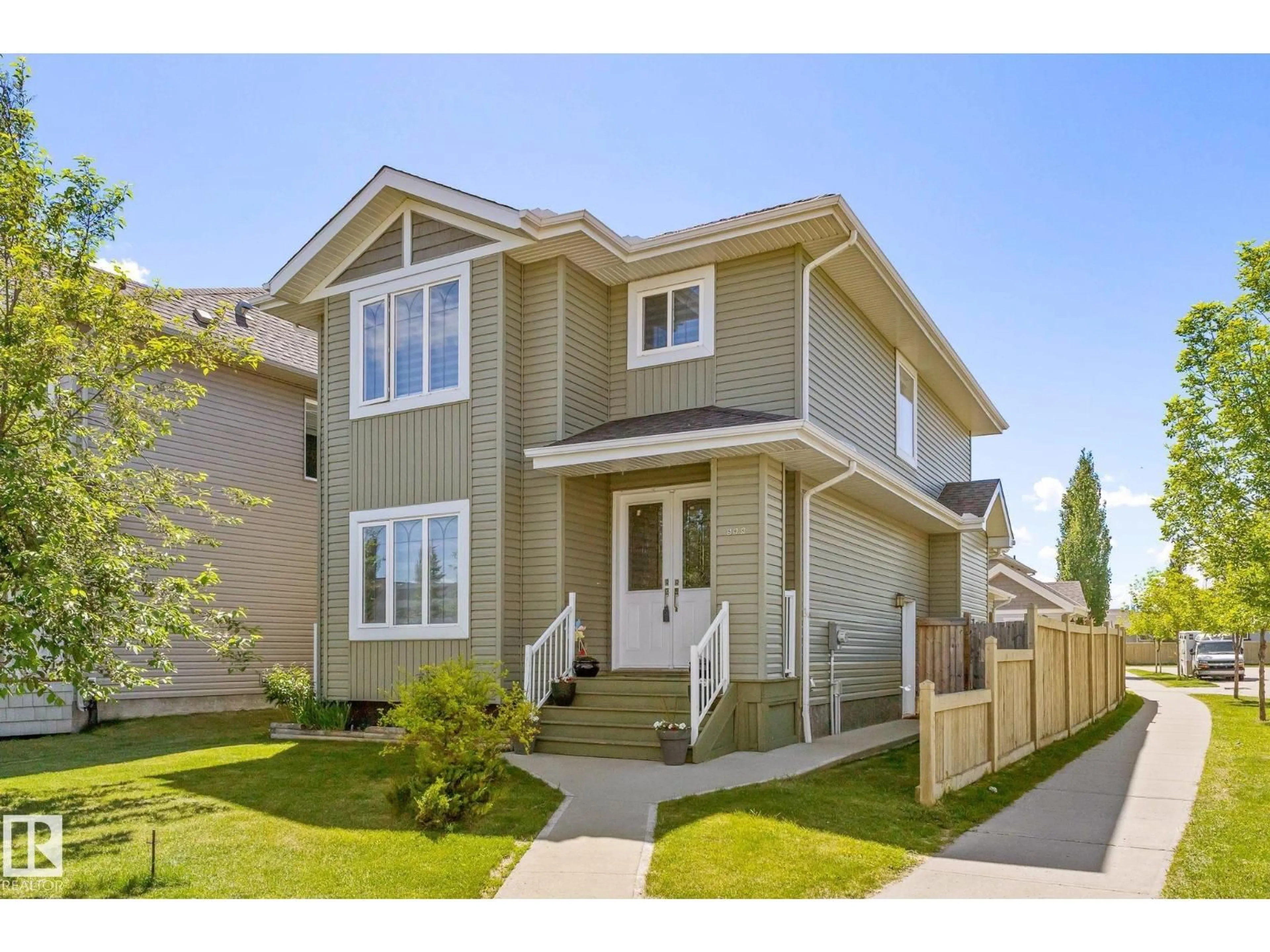 Home with vinyl exterior material, street for 598 TAMARACK RD, Edmonton Alberta T6T0M8