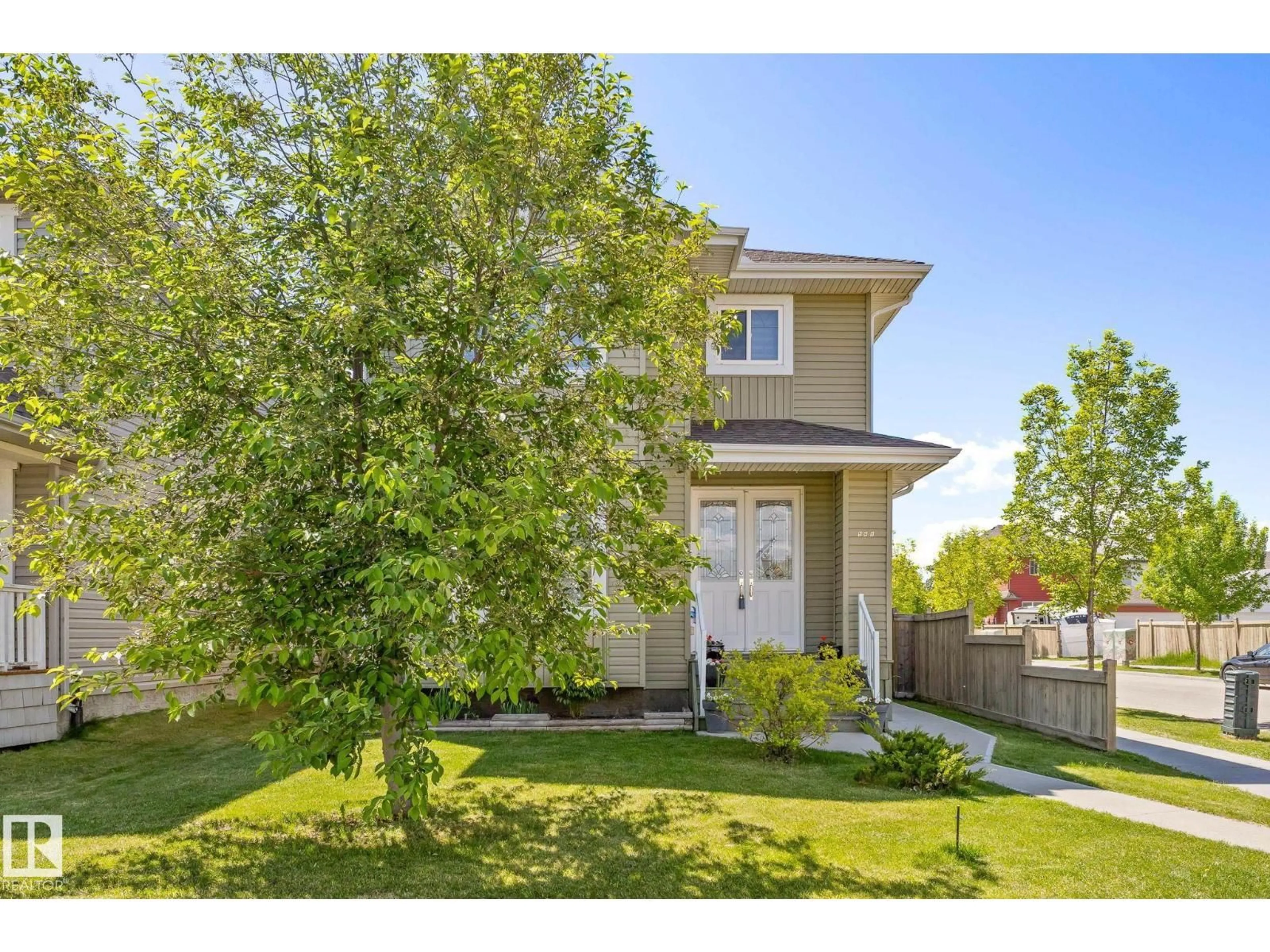 A pic from outside/outdoor area/front of a property/back of a property/a pic from drone, street for 598 TAMARACK RD, Edmonton Alberta T6T0M8