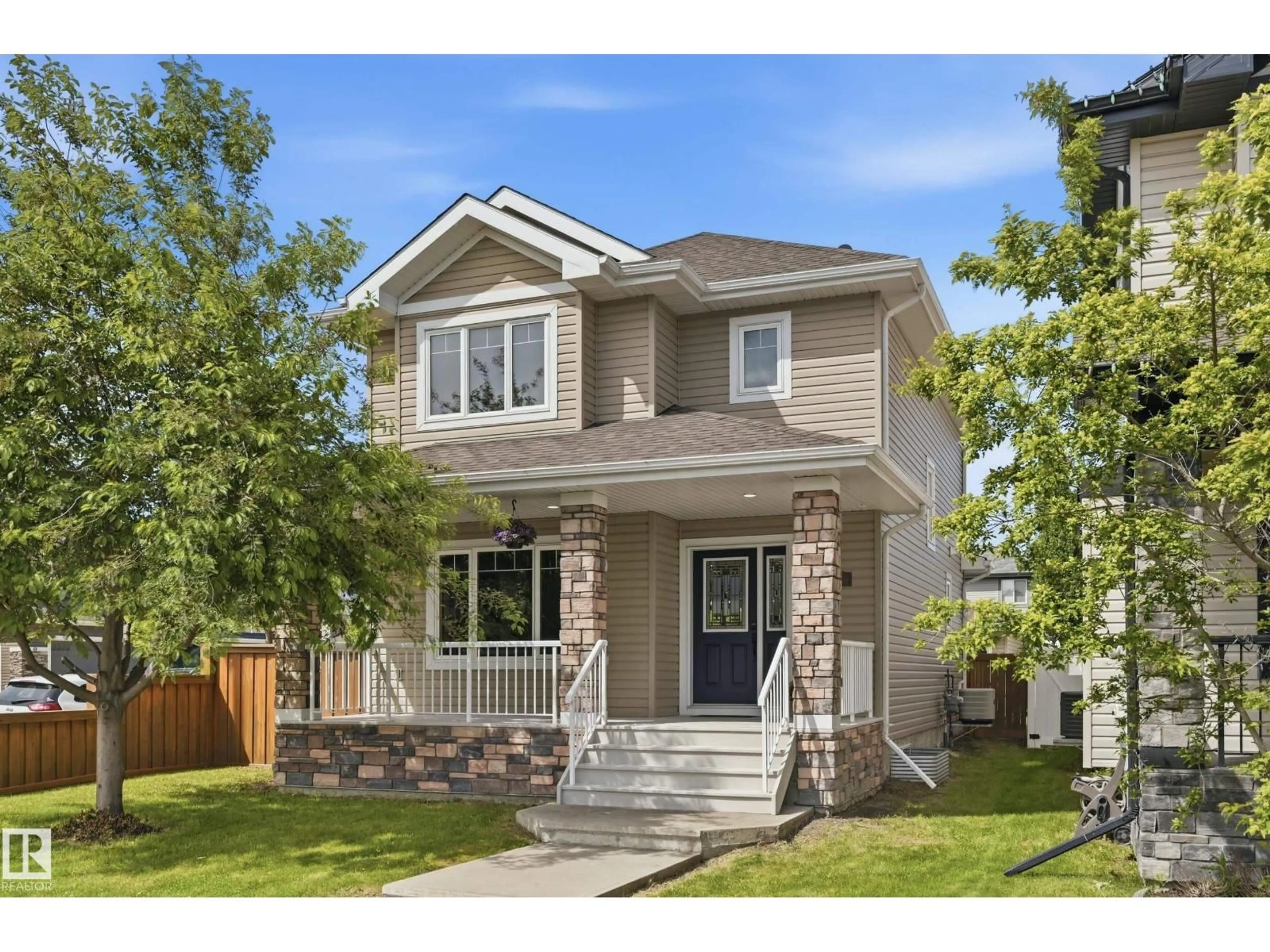 Home with vinyl exterior material, street for 148 ALLARD WY, Fort Saskatchewan Alberta T8L0N4