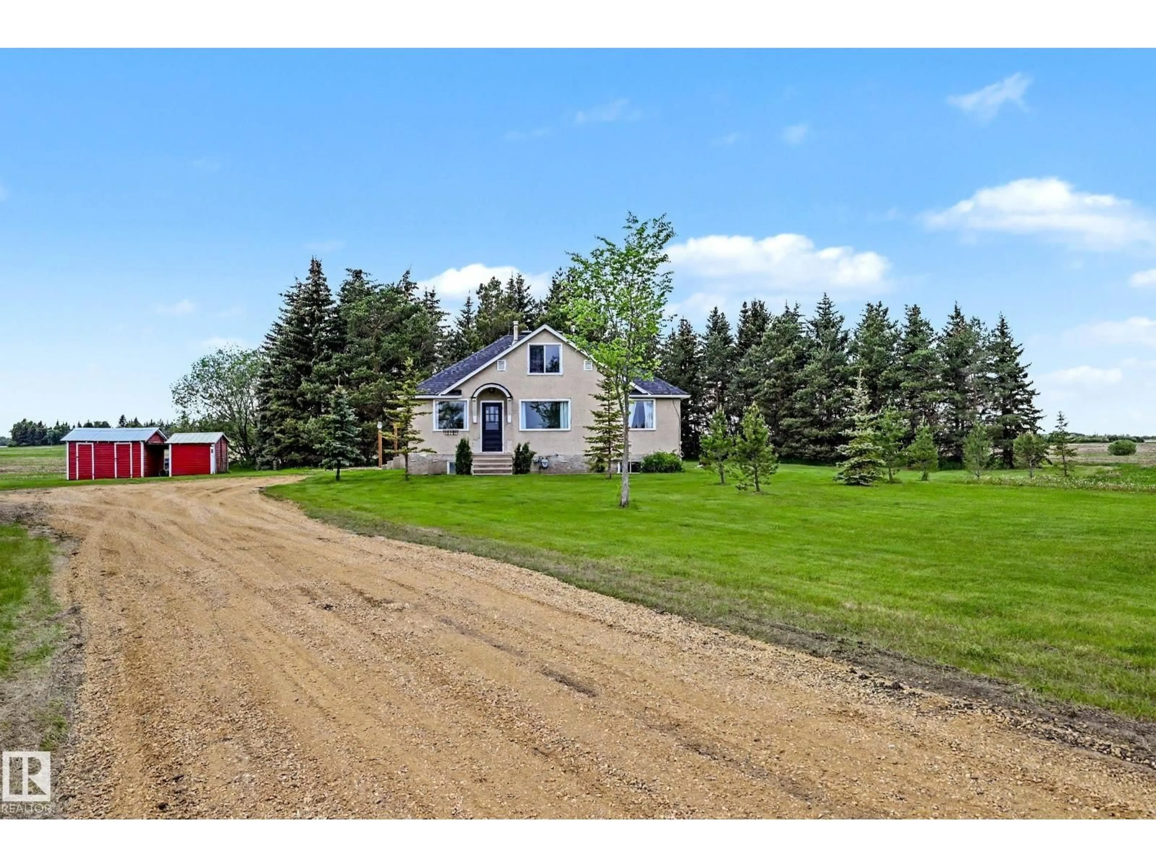A pic from outside/outdoor area/front of a property/back of a property/a pic from drone, unknown for 25418 HWY 37, Rural Sturgeon County Alberta T8T2A3