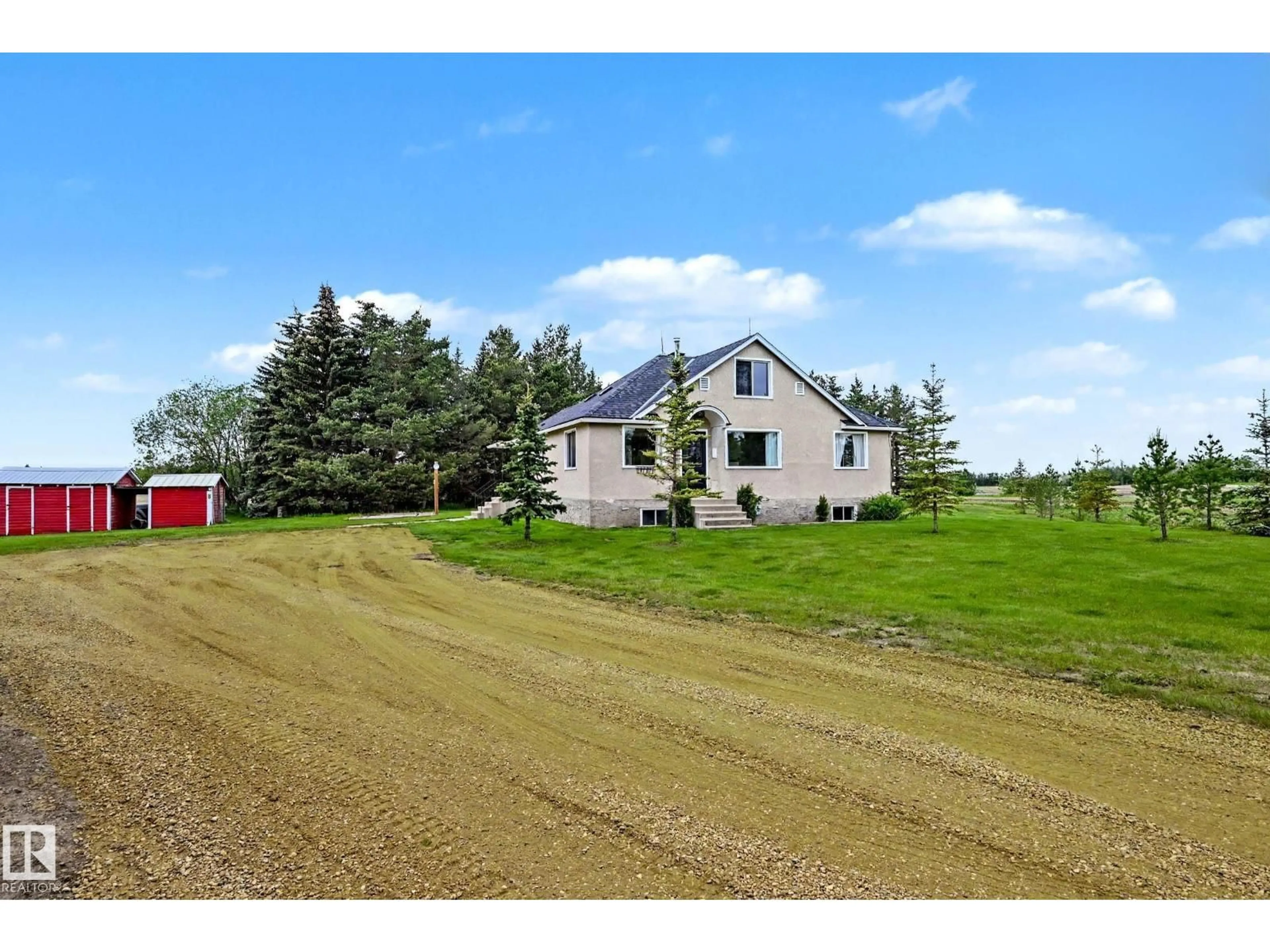 A pic from outside/outdoor area/front of a property/back of a property/a pic from drone, unknown for 25418 HWY 37, Rural Sturgeon County Alberta T8T2A3