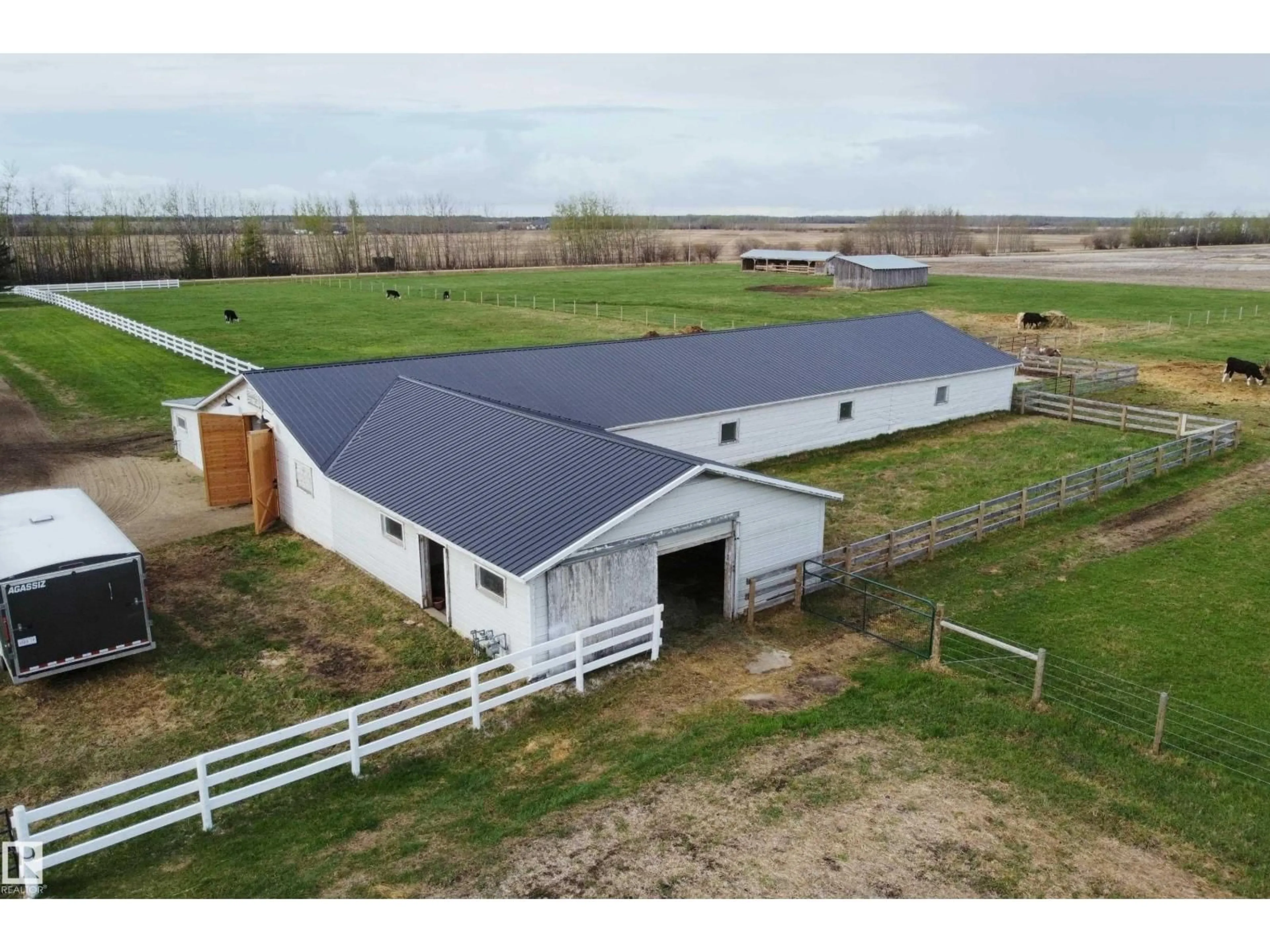 A pic from outside/outdoor area/front of a property/back of a property/a pic from drone, building for 3418 TWP RD 620, Rural Barrhead County Alberta T7N1N2