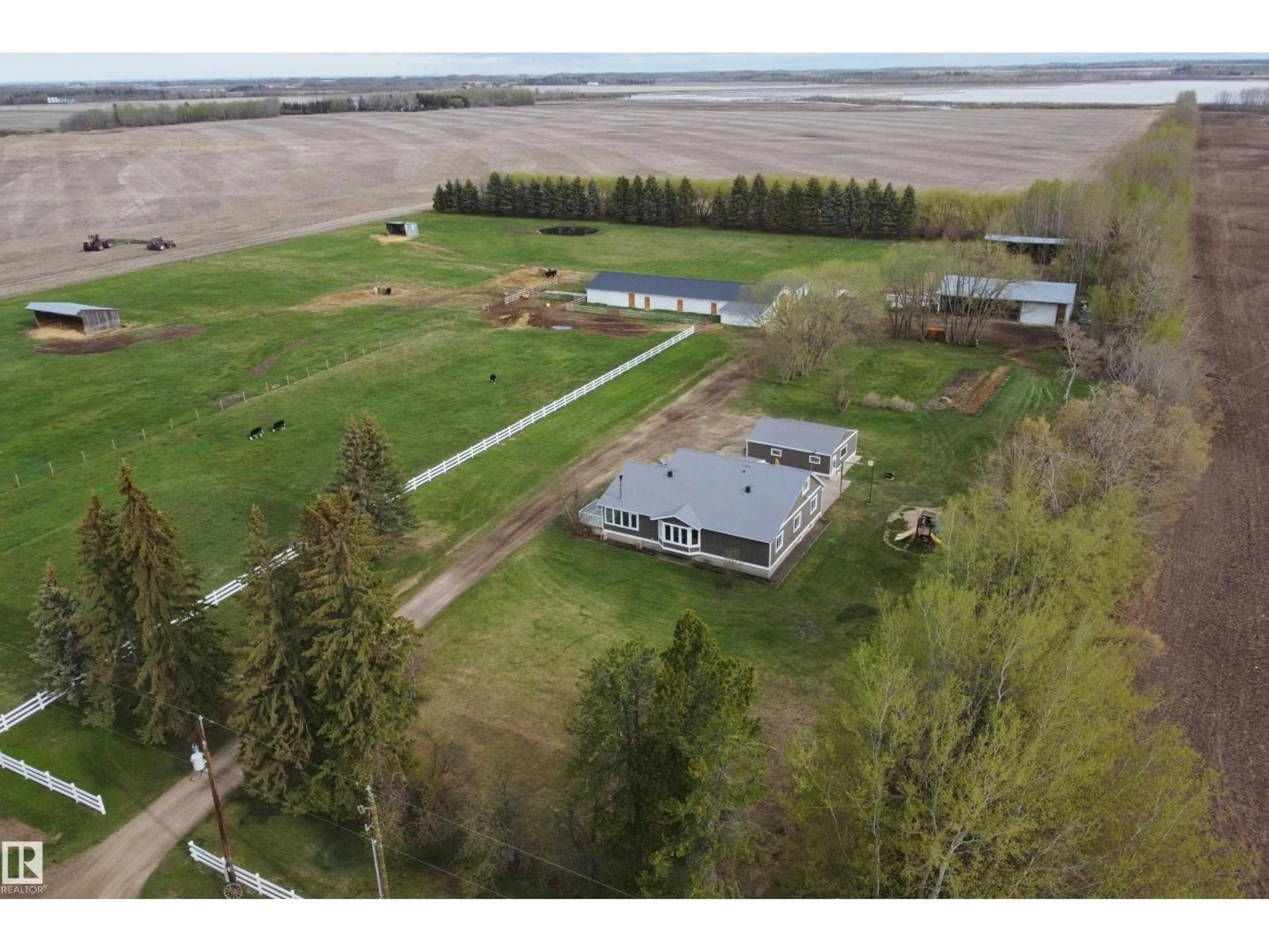 A pic from outside/outdoor area/front of a property/back of a property/a pic from drone, building for 3418 TWP RD 620, Rural Barrhead County Alberta T7N1N2
