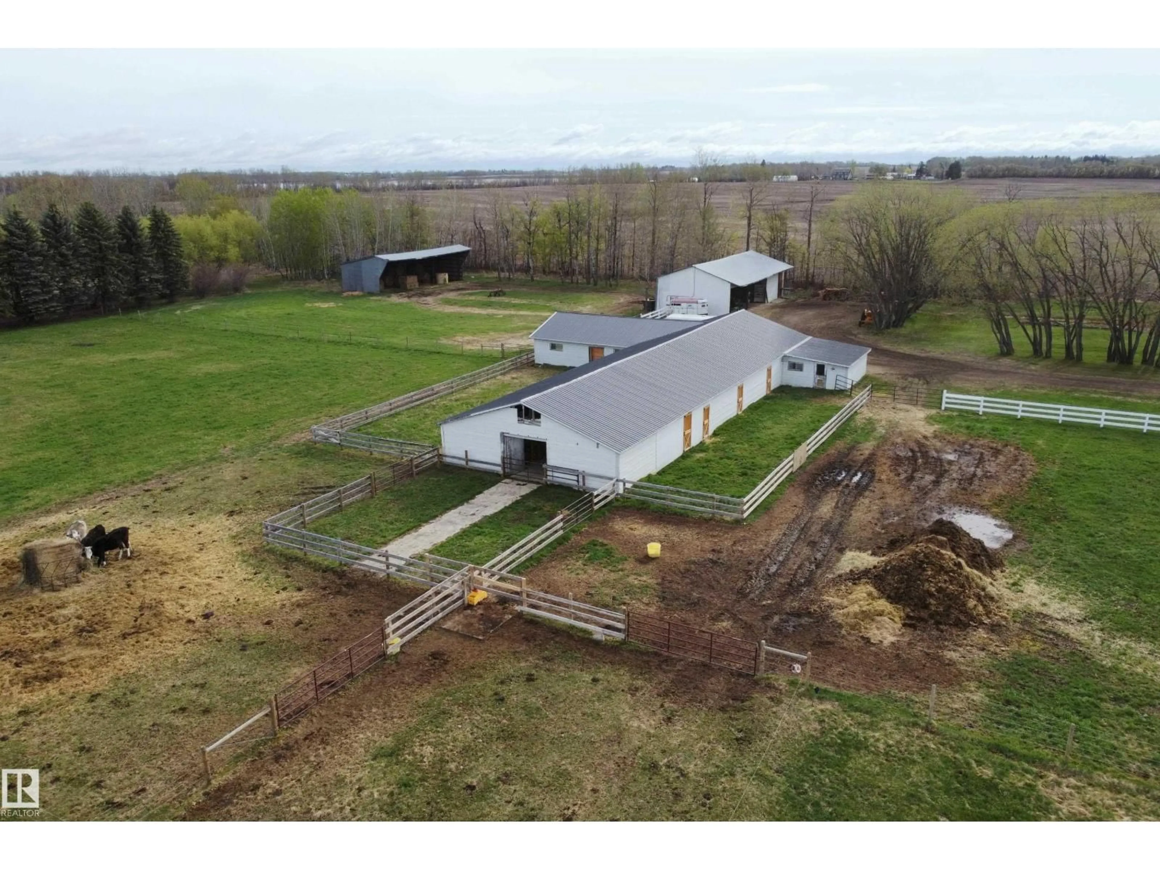 A pic from outside/outdoor area/front of a property/back of a property/a pic from drone, building for 3418 TWP RD 620, Rural Barrhead County Alberta T7N1N2