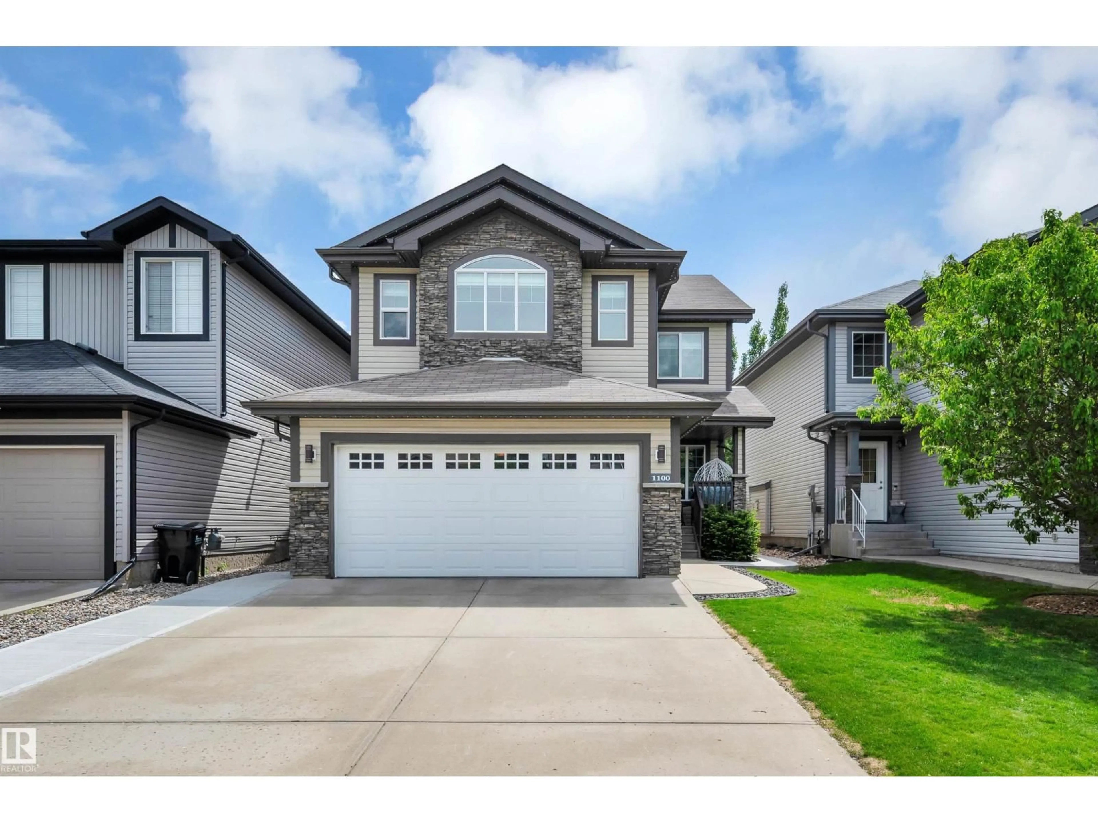 Home with vinyl exterior material, street for 1100 FOXWOOD CR, Sherwood Park Alberta T8A4X4