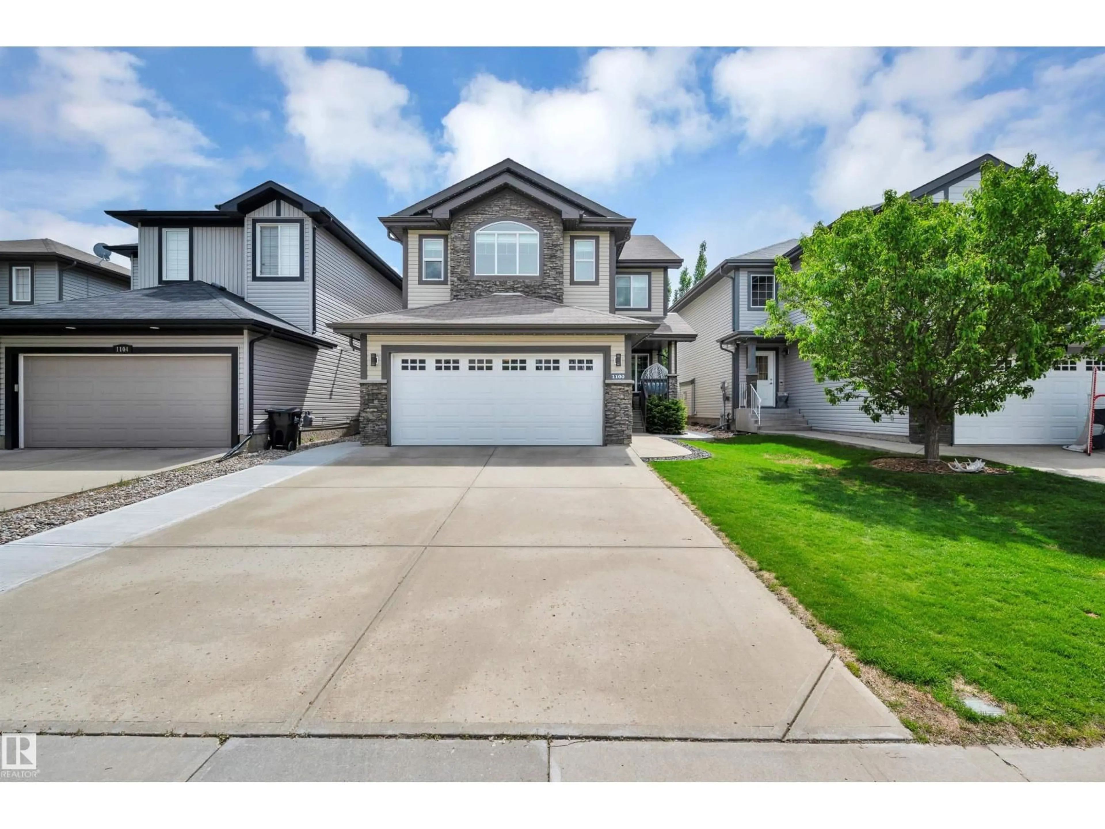 Home with vinyl exterior material, street for 1100 FOXWOOD CR, Sherwood Park Alberta T8A4X4
