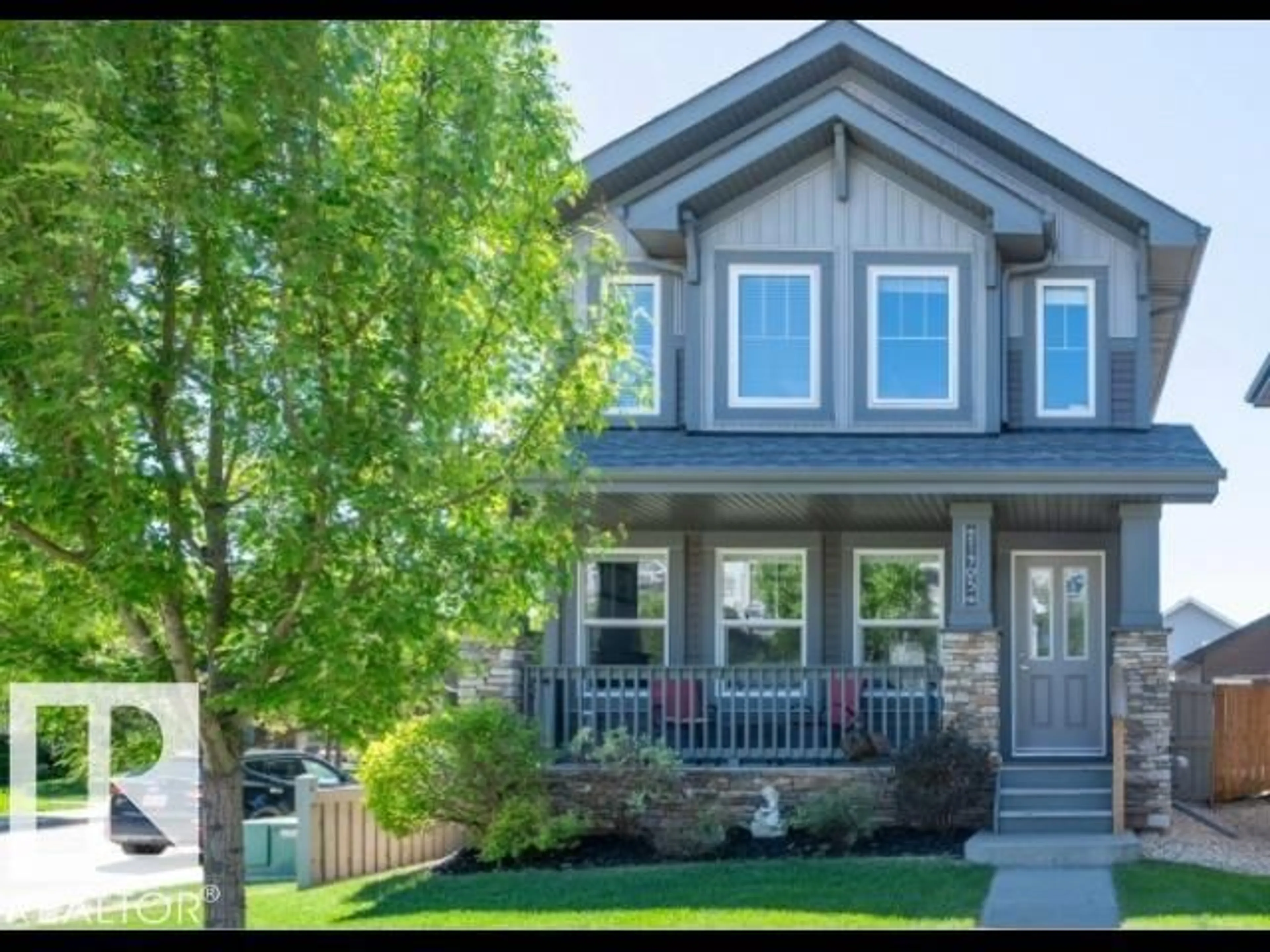 Home with vinyl exterior material, street for 21903 91 AV, Edmonton Alberta T5T6Z8