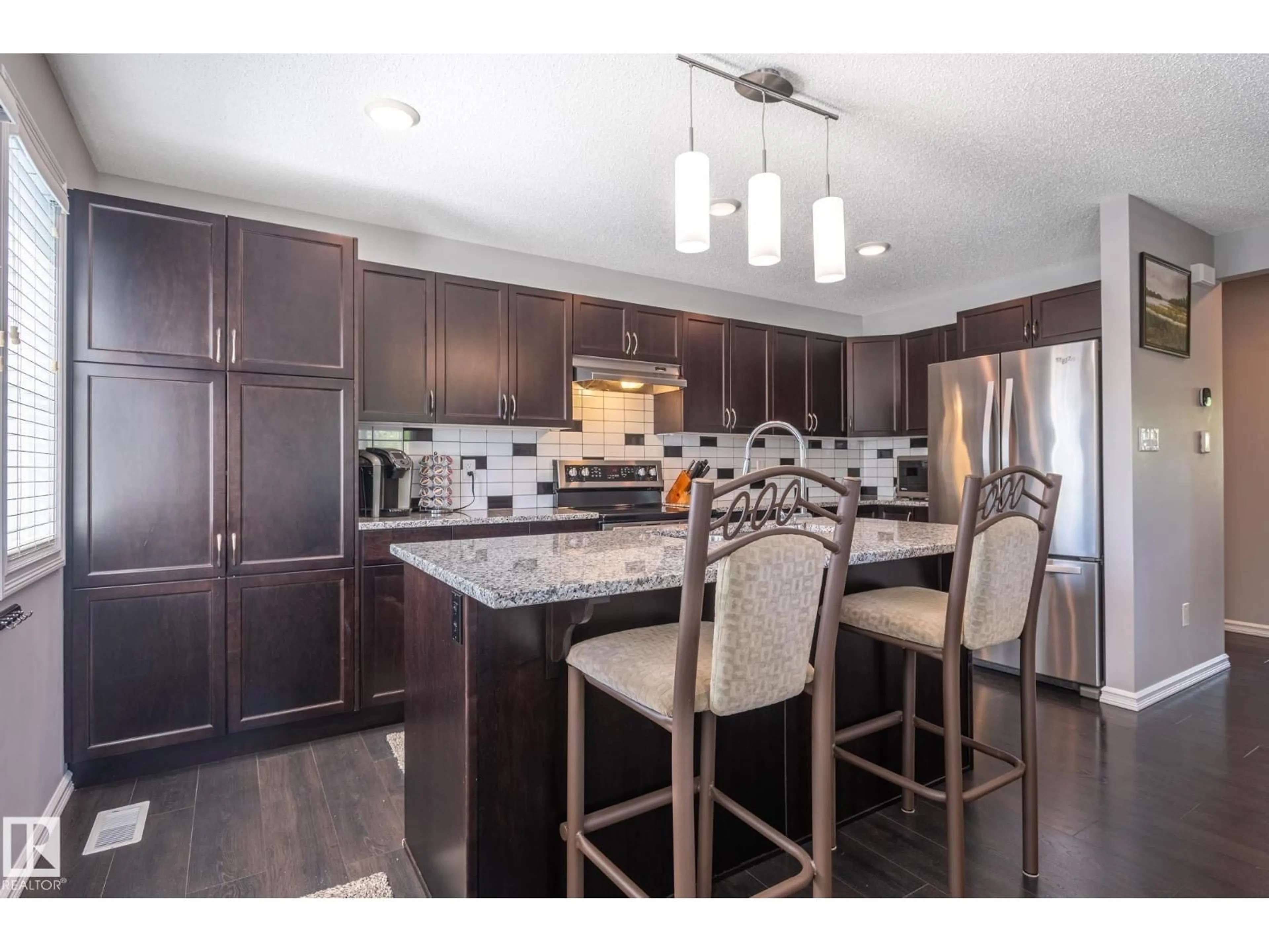 Open concept kitchen, unknown for 21903 91 AV, Edmonton Alberta T5T6Z8