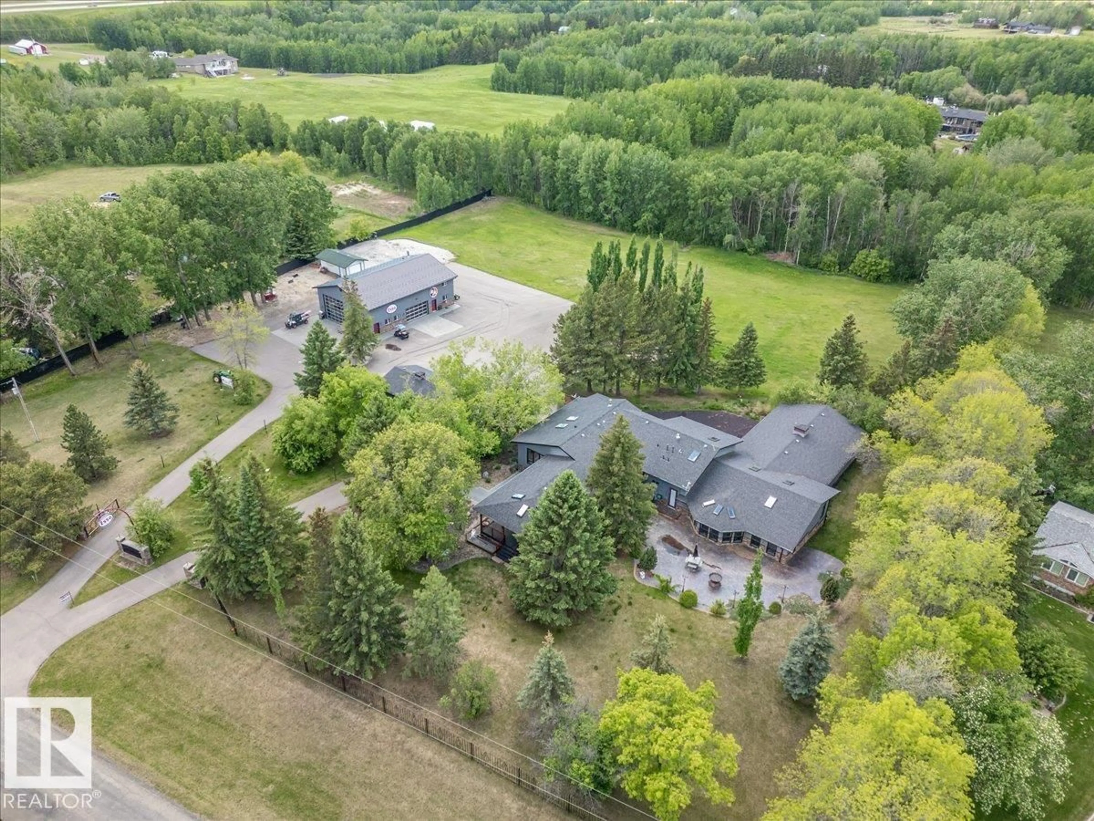 A pic from outside/outdoor area/front of a property/back of a property/a pic from drone, unknown for 15 - 25 53212 RGE ROAD, Rural Parkland County Alberta T7Y0C3