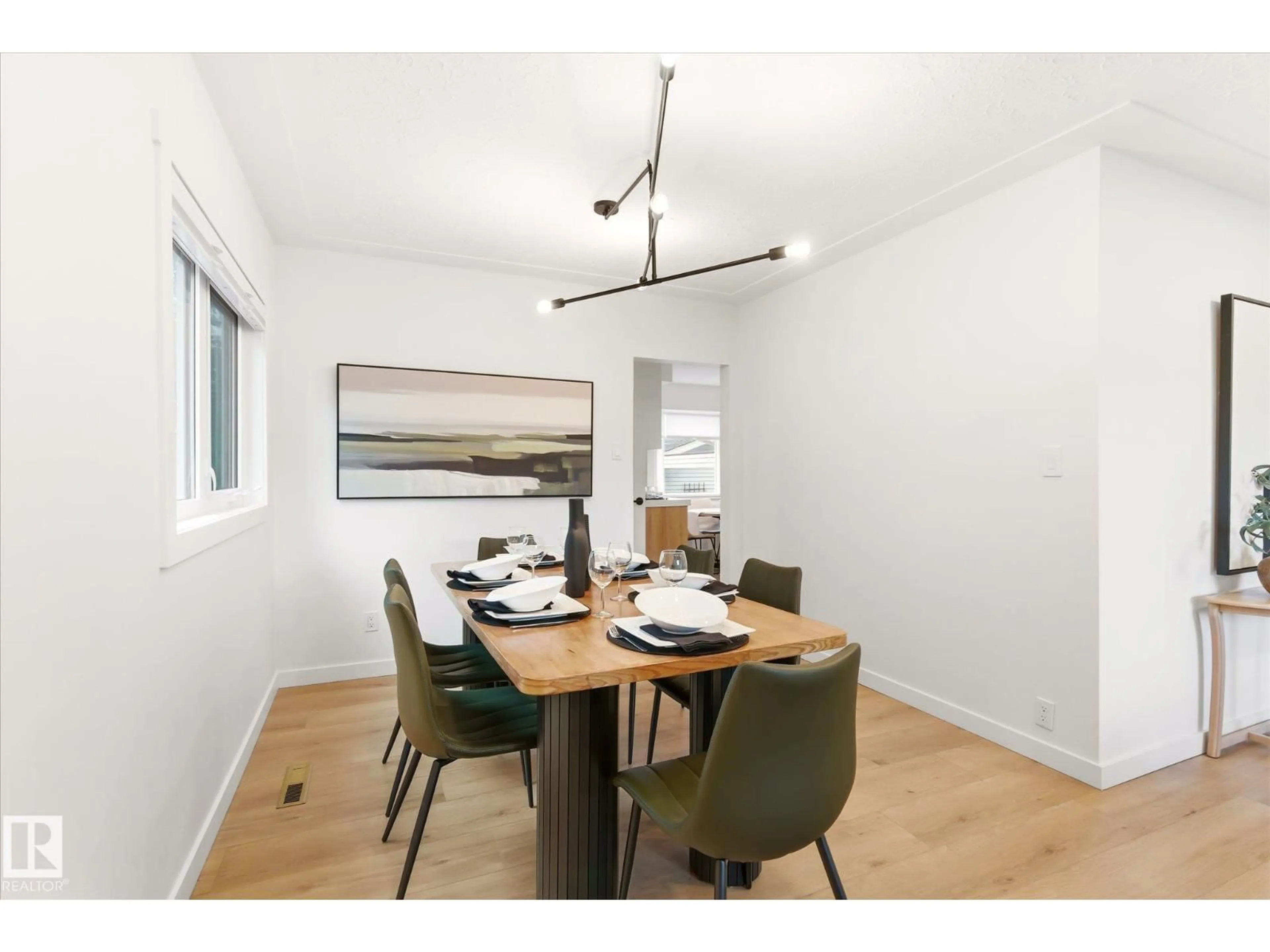 Dining room, wood/laminate floor for 9024 147 ST, Edmonton Alberta T5R0Y5