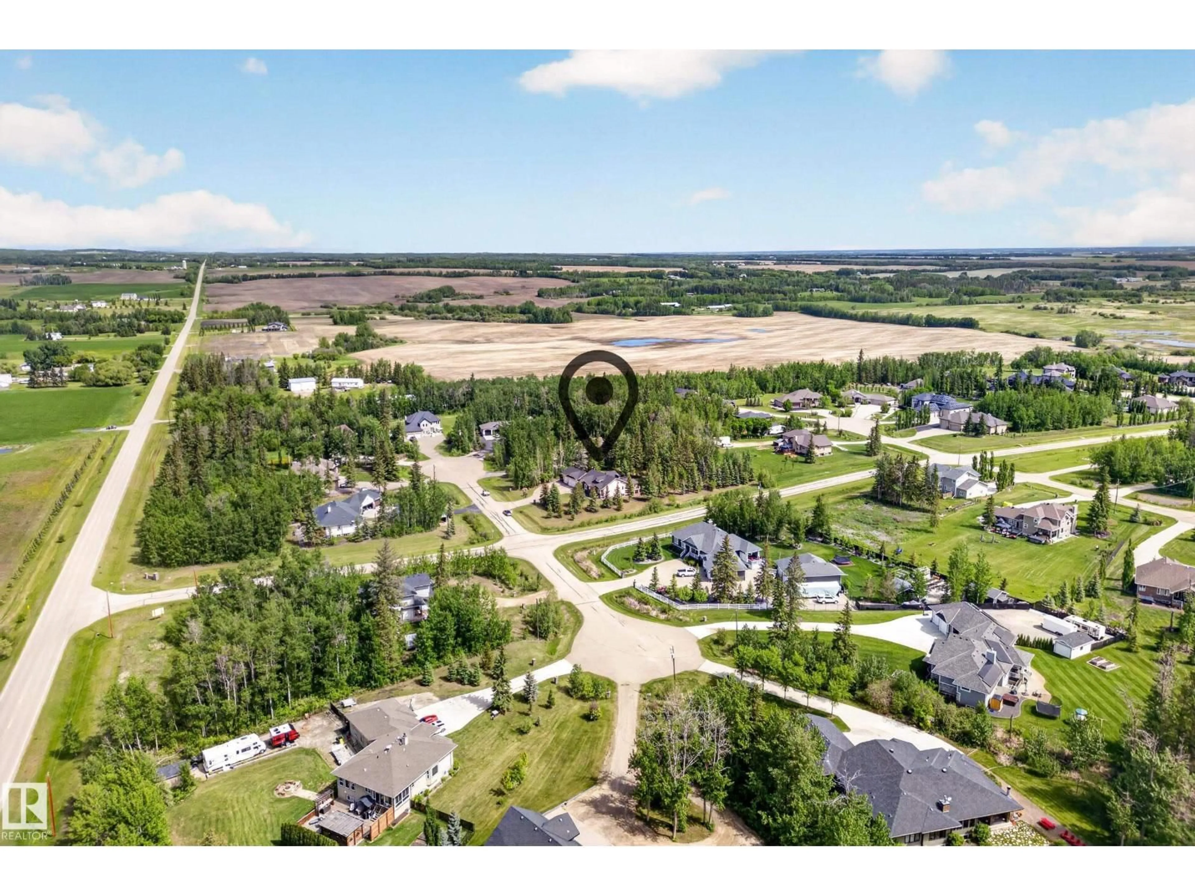A pic from outside/outdoor area/front of a property/back of a property/a pic from drone, unknown for 86 53305 RGE ROAD 273, Rural Parkland County Alberta T7X3N3
