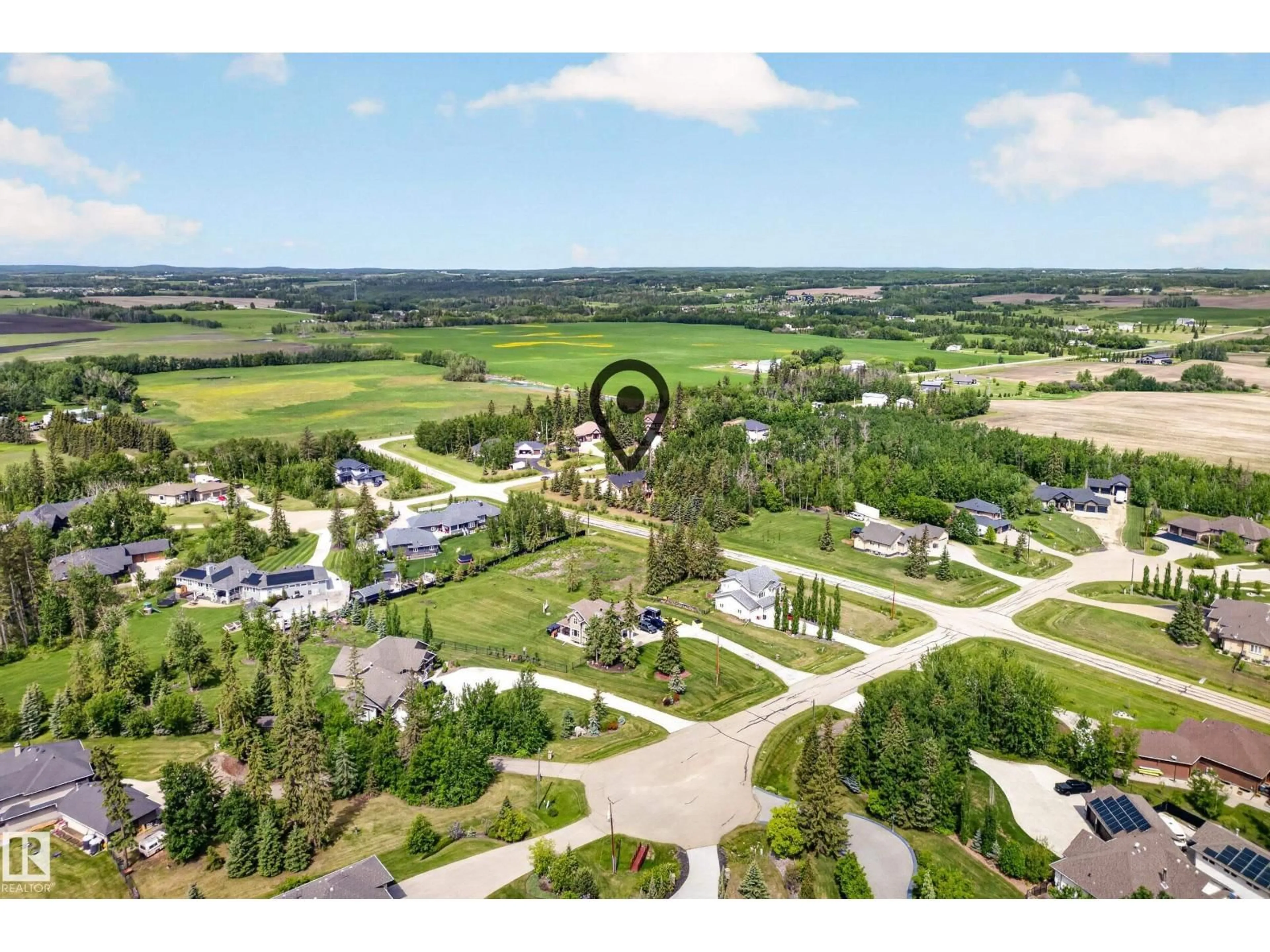 A pic from outside/outdoor area/front of a property/back of a property/a pic from drone, unknown for 86 53305 RGE ROAD 273, Rural Parkland County Alberta T7X3N3