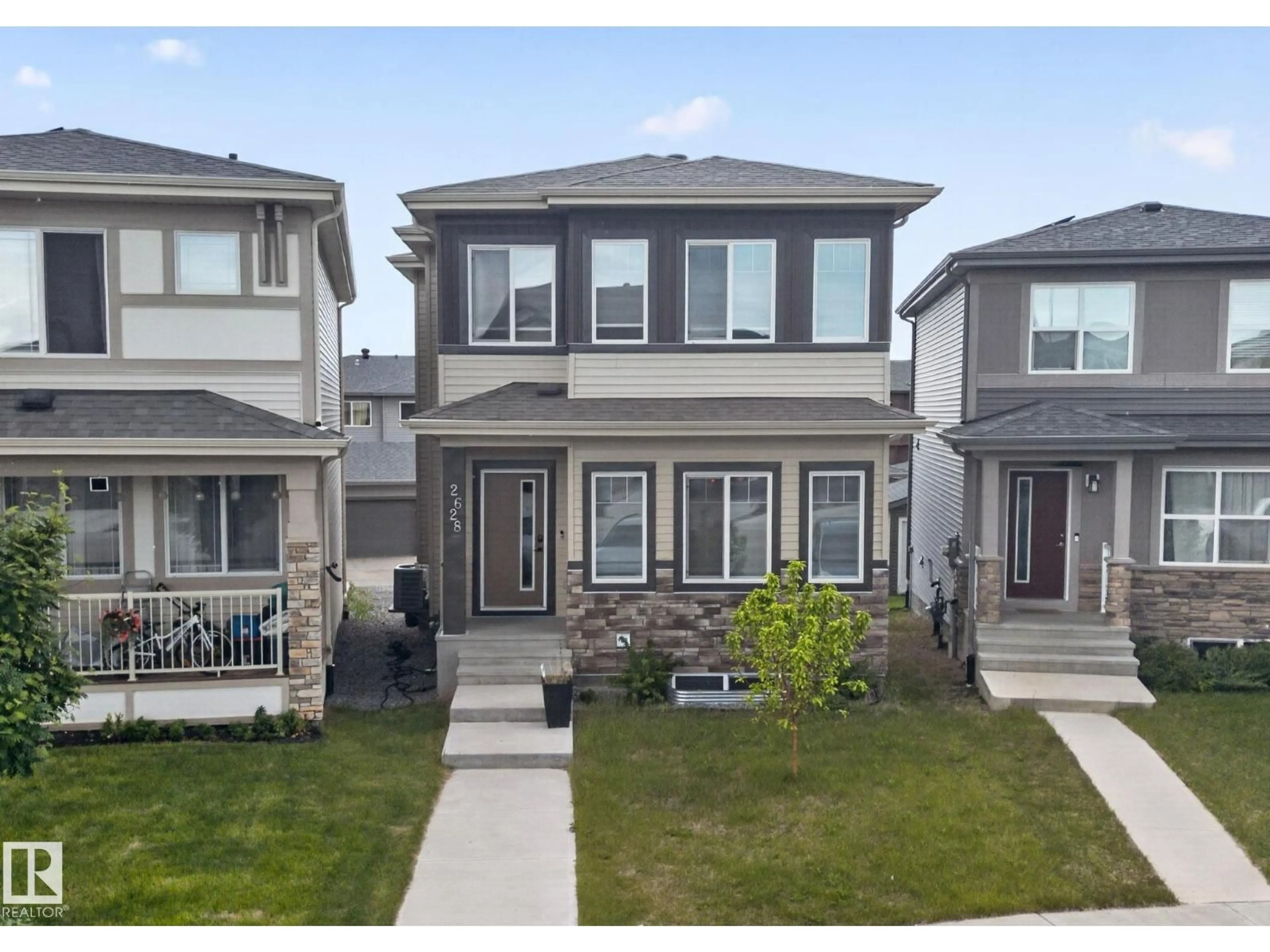 A pic from outside/outdoor area/front of a property/back of a property/a pic from drone, street for 2628 200 ST, Edmonton Alberta T6M1K3