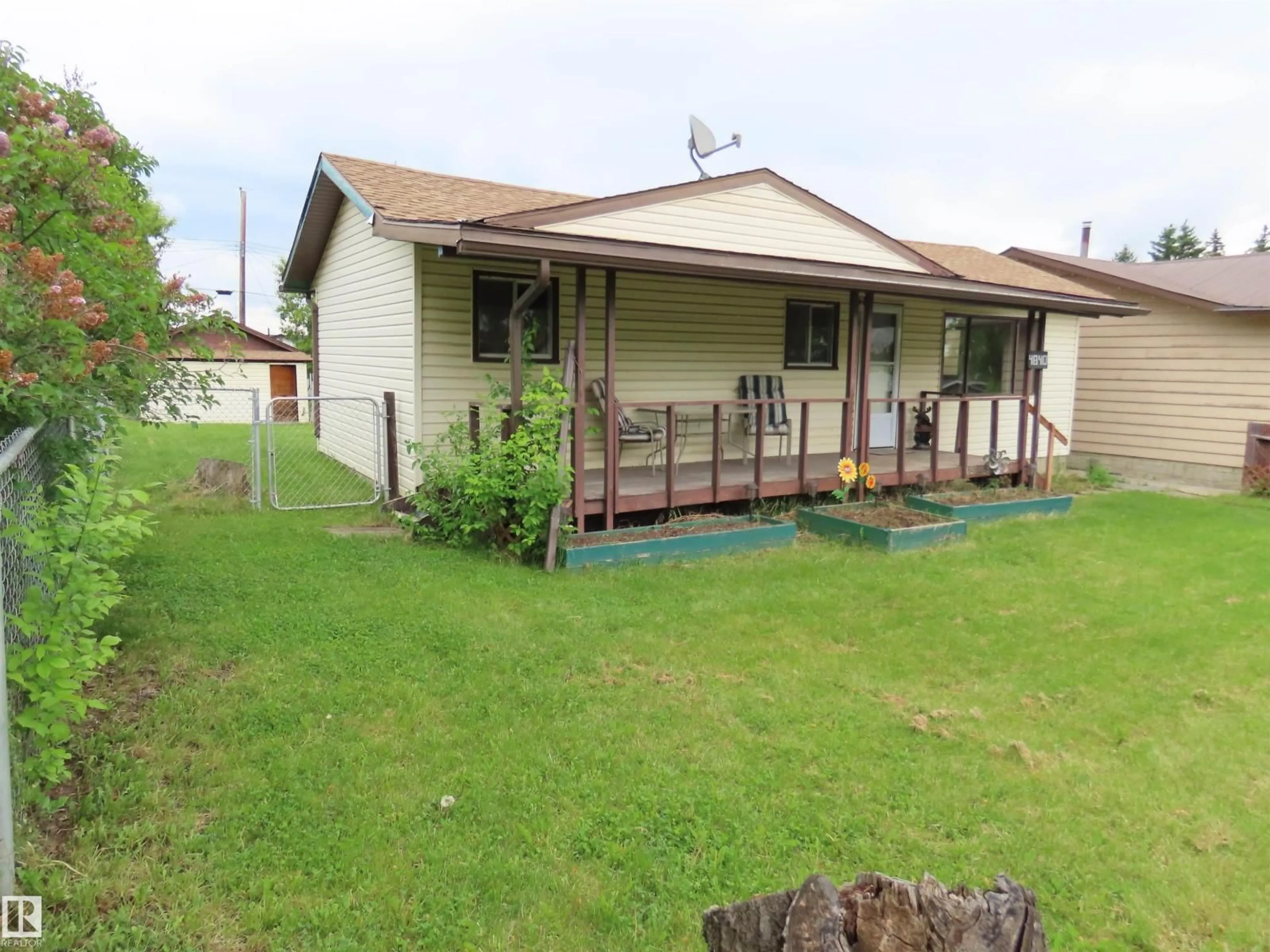 A pic from outside/outdoor area/front of a property/back of a property/a pic from drone, street for 4840 51 AV, Sangudo Alberta T0E2A0