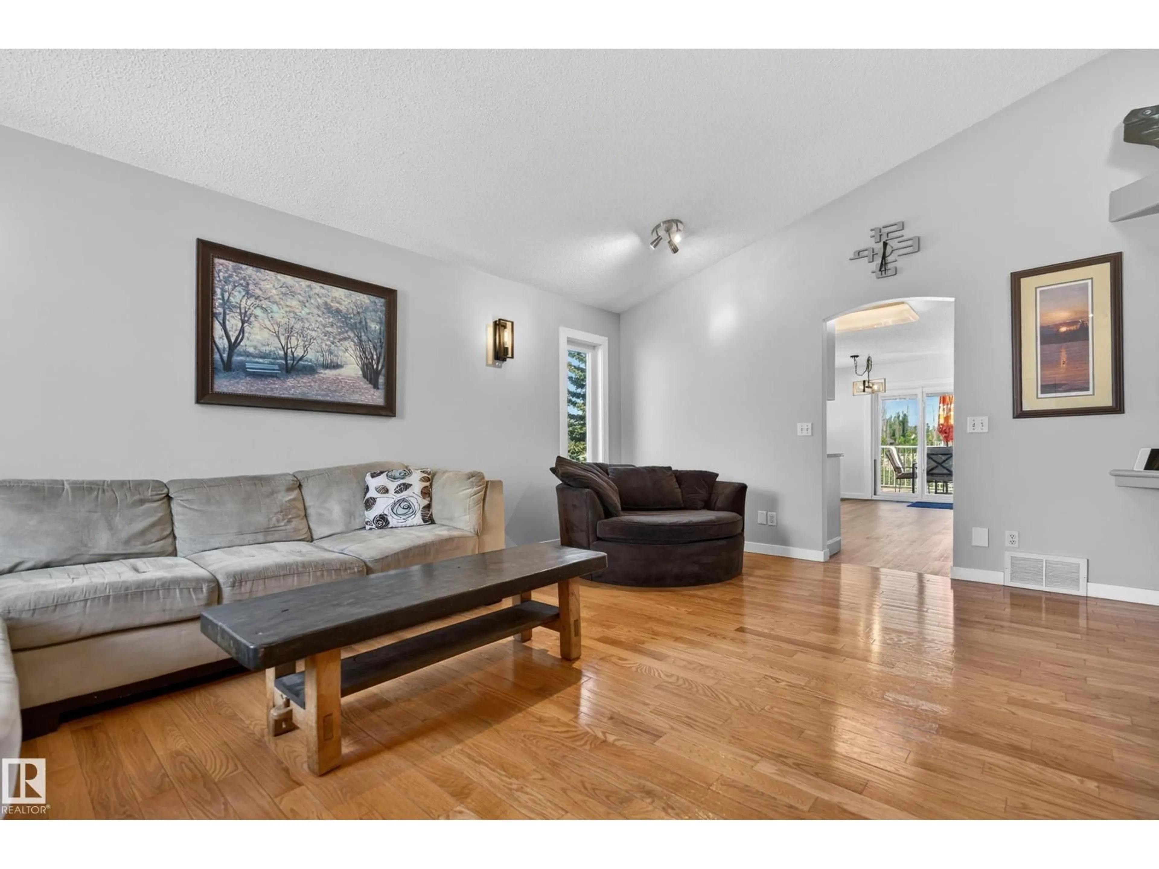 Living room with furniture, wood/laminate floor for 592 RAINBOW CR, Sherwood Park Alberta T8A5N6