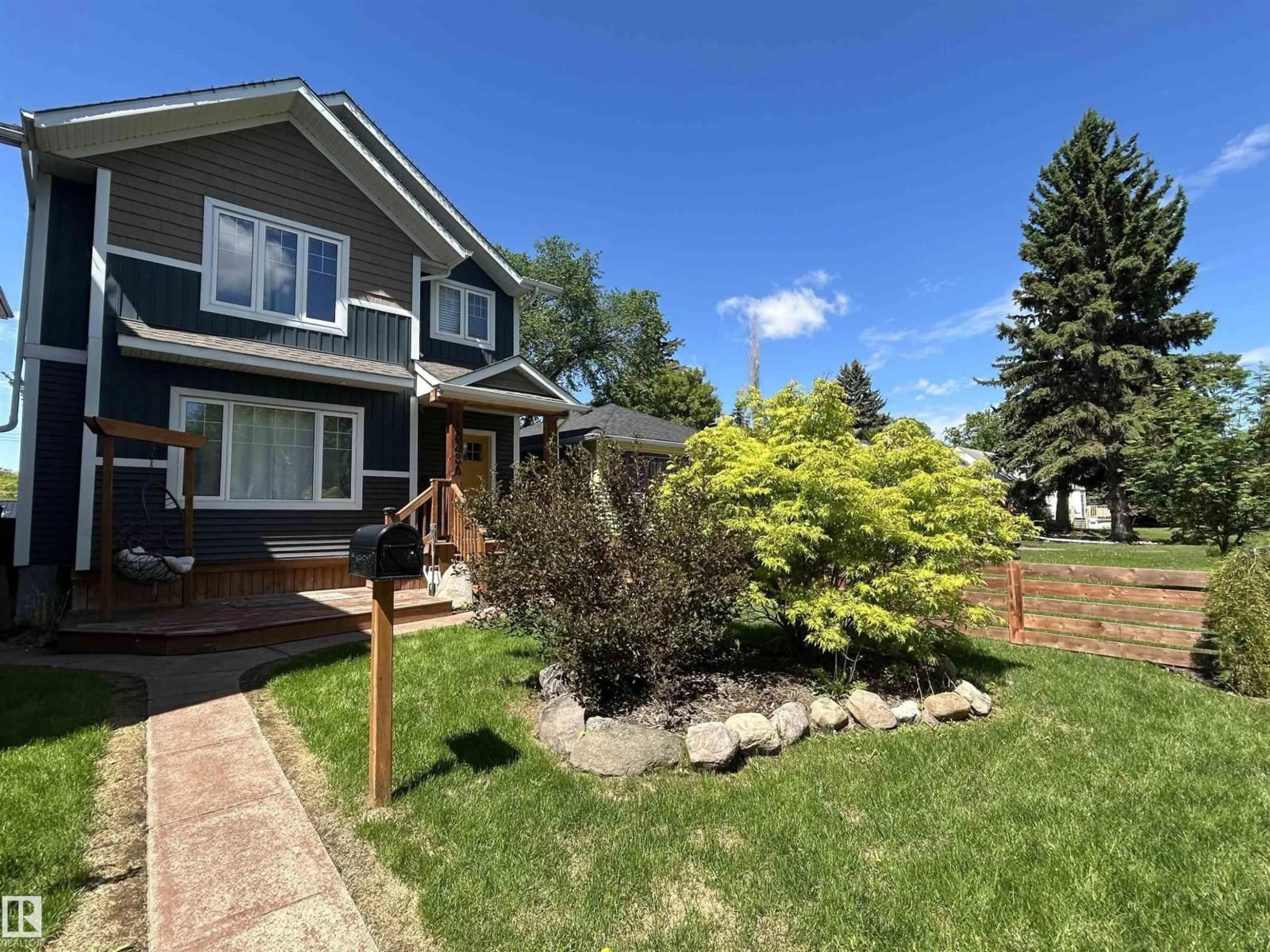 A pic from outside/outdoor area/front of a property/back of a property/a pic from drone, street for 10430 148 ST, Edmonton Alberta T5M3G8