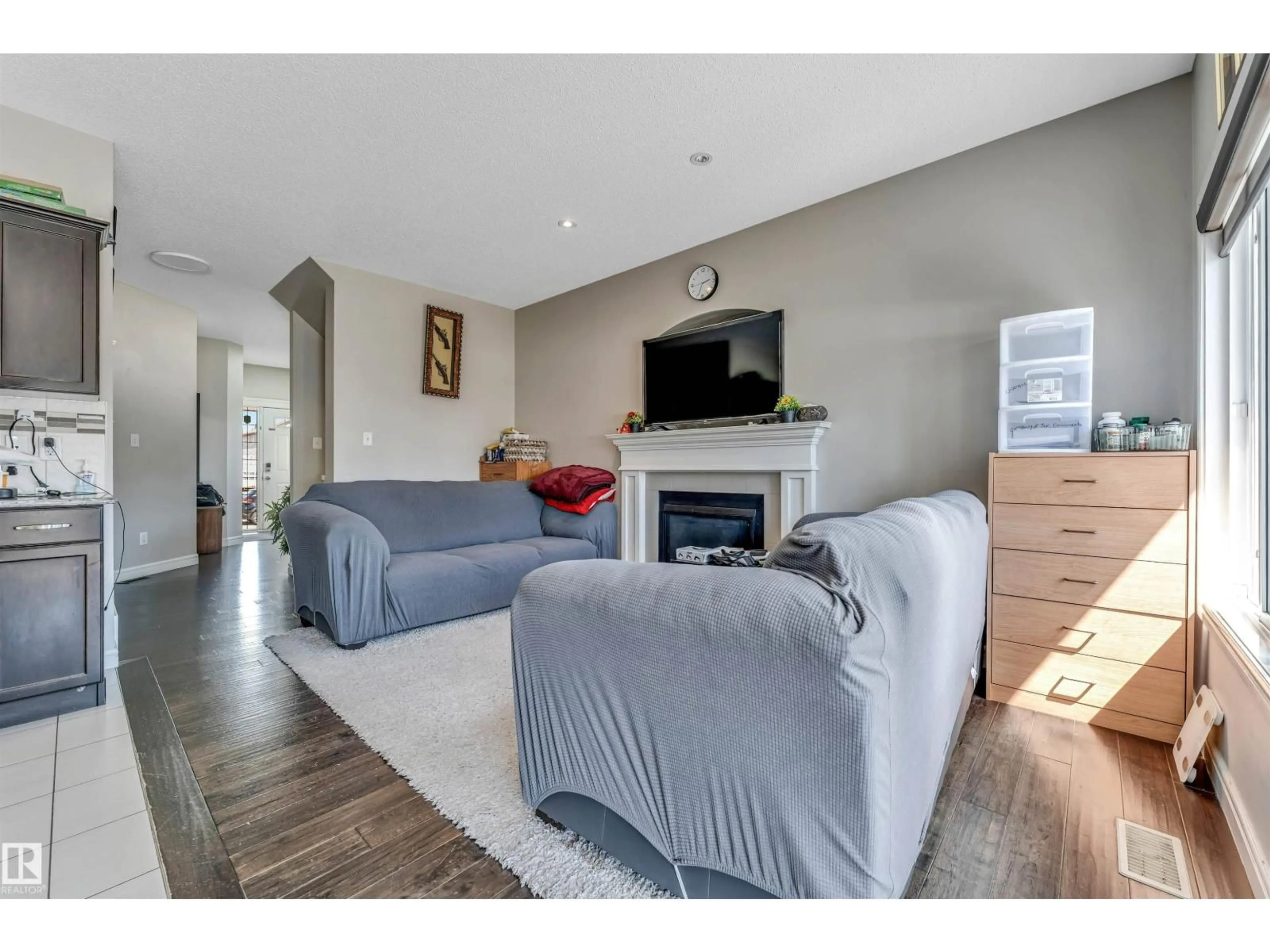 Living room with furniture, unknown for 2903 16 AVE NW, Edmonton Alberta T6T0Z6