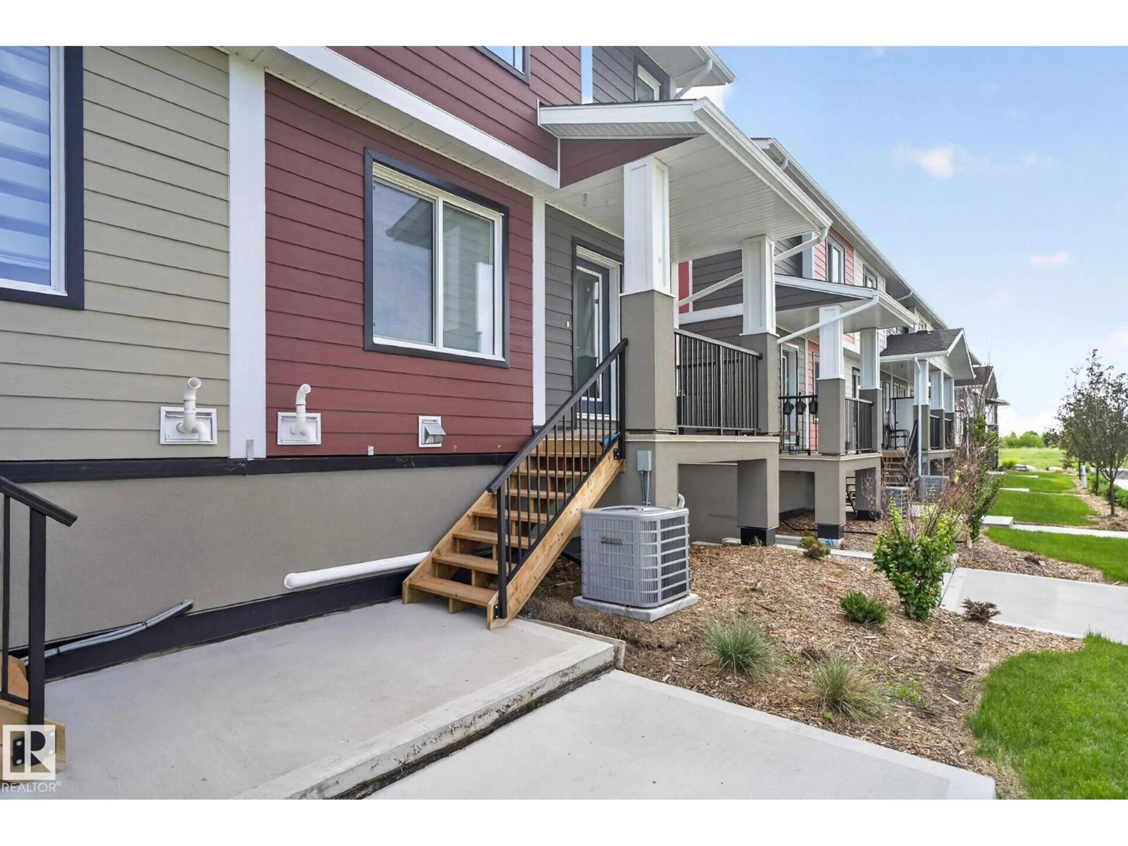 Home with vinyl exterior material, street for 9250 - 16 156 AV, Edmonton Alberta T5Z3N7
