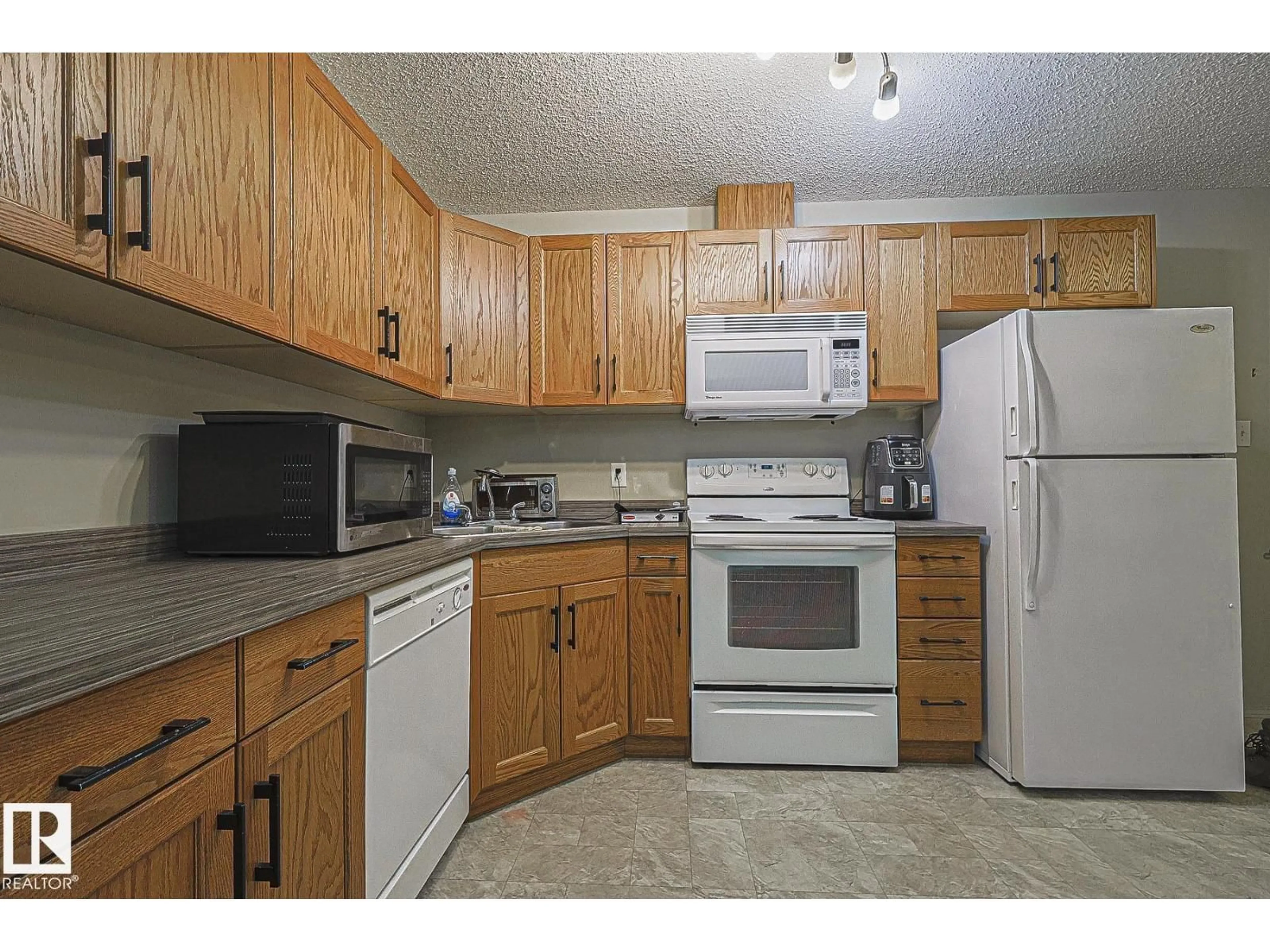 Standard kitchen, unknown for 309 - 119 CLAREVIEW STATION DR, Edmonton Alberta T5Y0C5