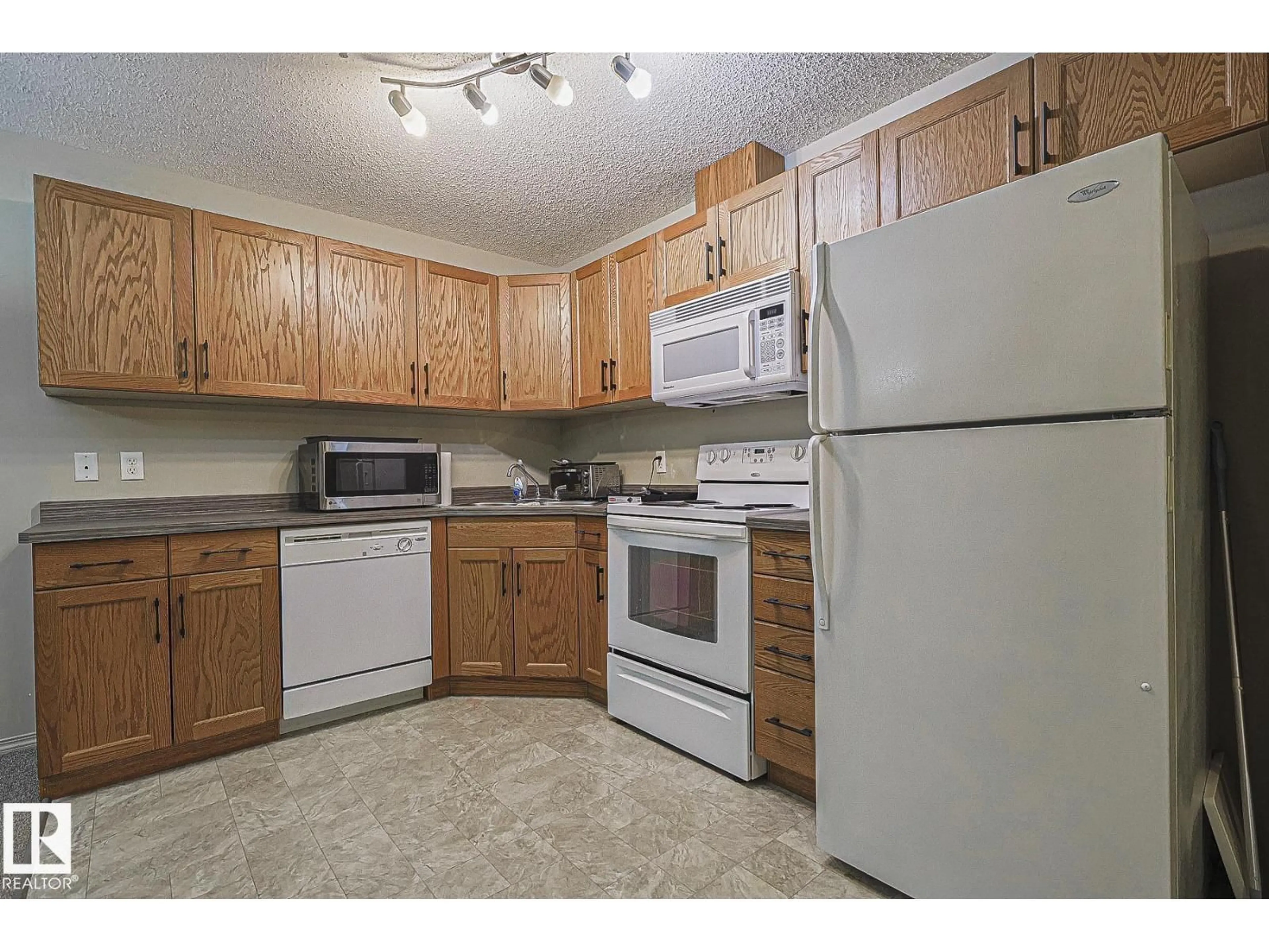 Standard kitchen, unknown for 309 - 119 CLAREVIEW STATION DR, Edmonton Alberta T5Y0C5