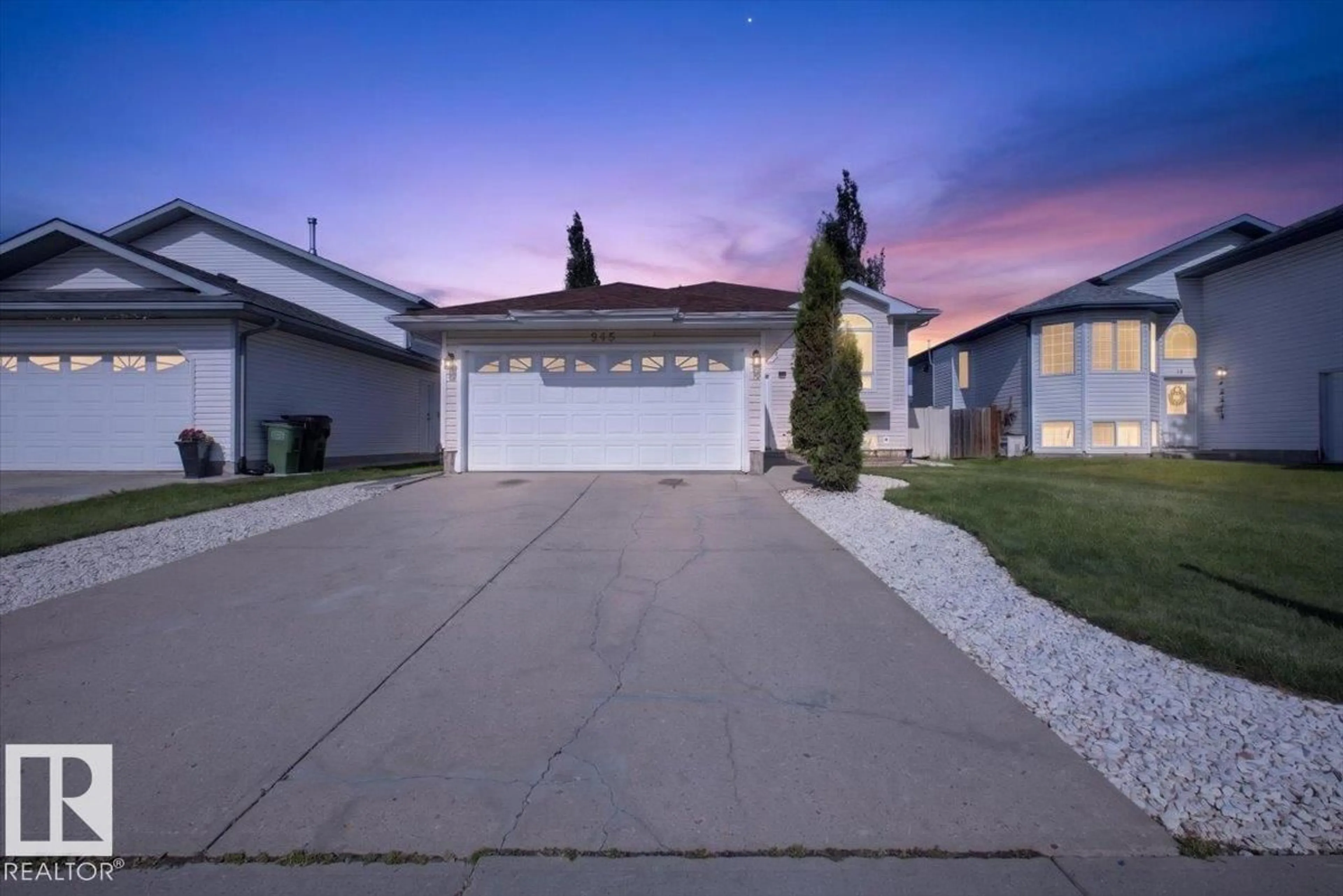 Home with vinyl exterior material, street for 946 JORDAN CR, Edmonton Alberta T6L6X4