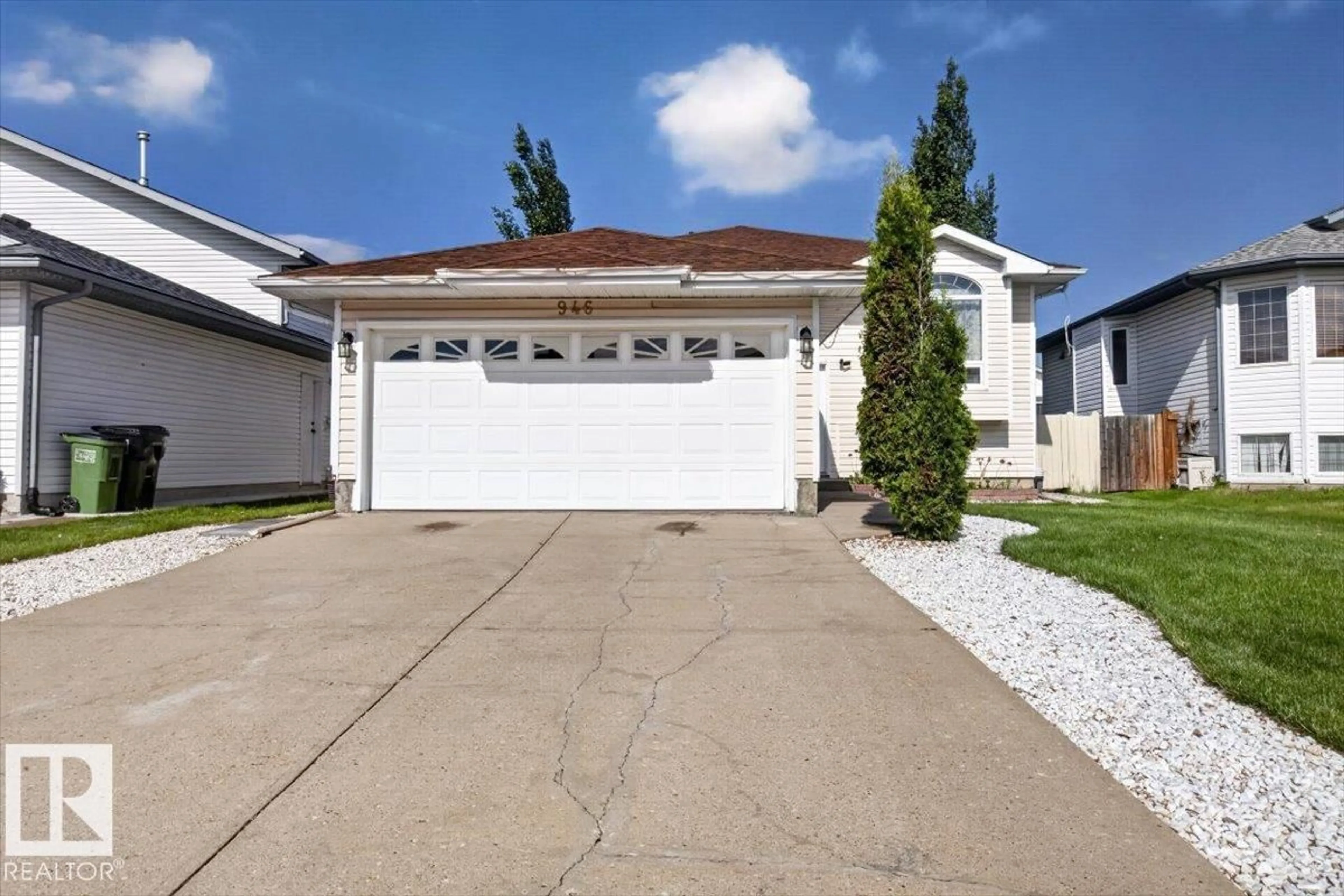Home with vinyl exterior material, street for 946 JORDAN CR, Edmonton Alberta T6L6X4