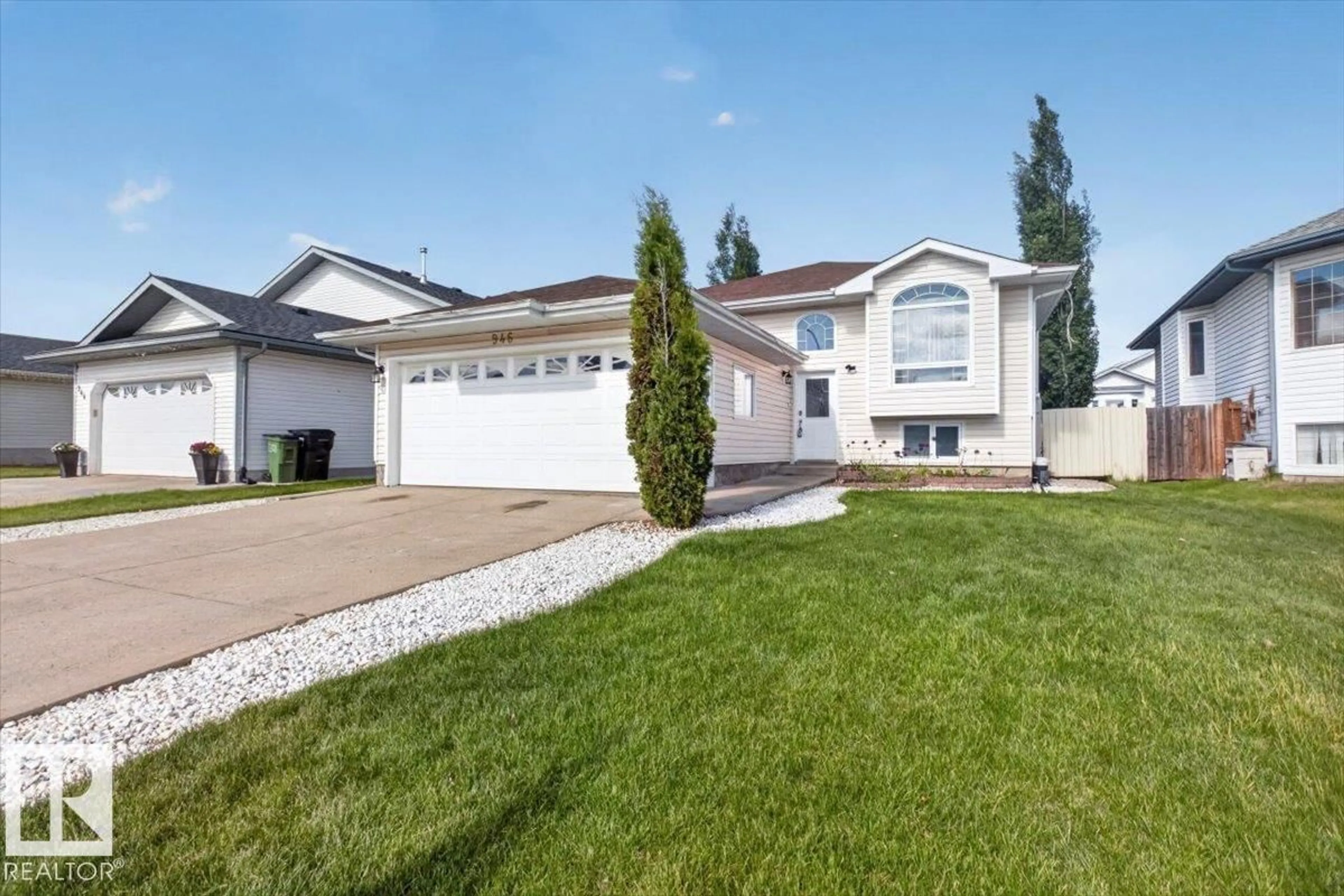 Home with vinyl exterior material, street for 946 JORDAN CR, Edmonton Alberta T6L6X4