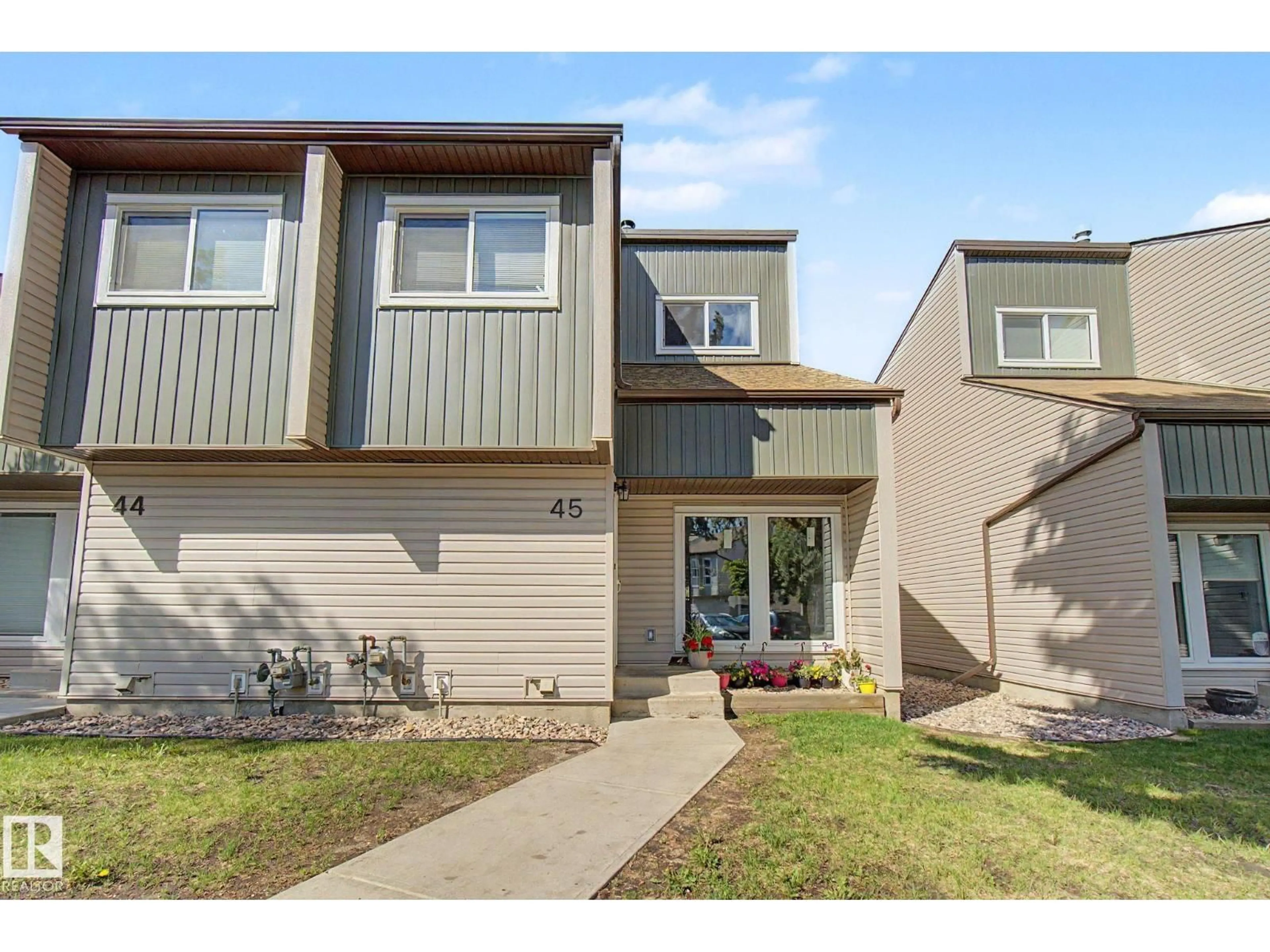 Home with vinyl exterior material, street for #45 - 2020 105 ST, Edmonton Alberta T6J5J2