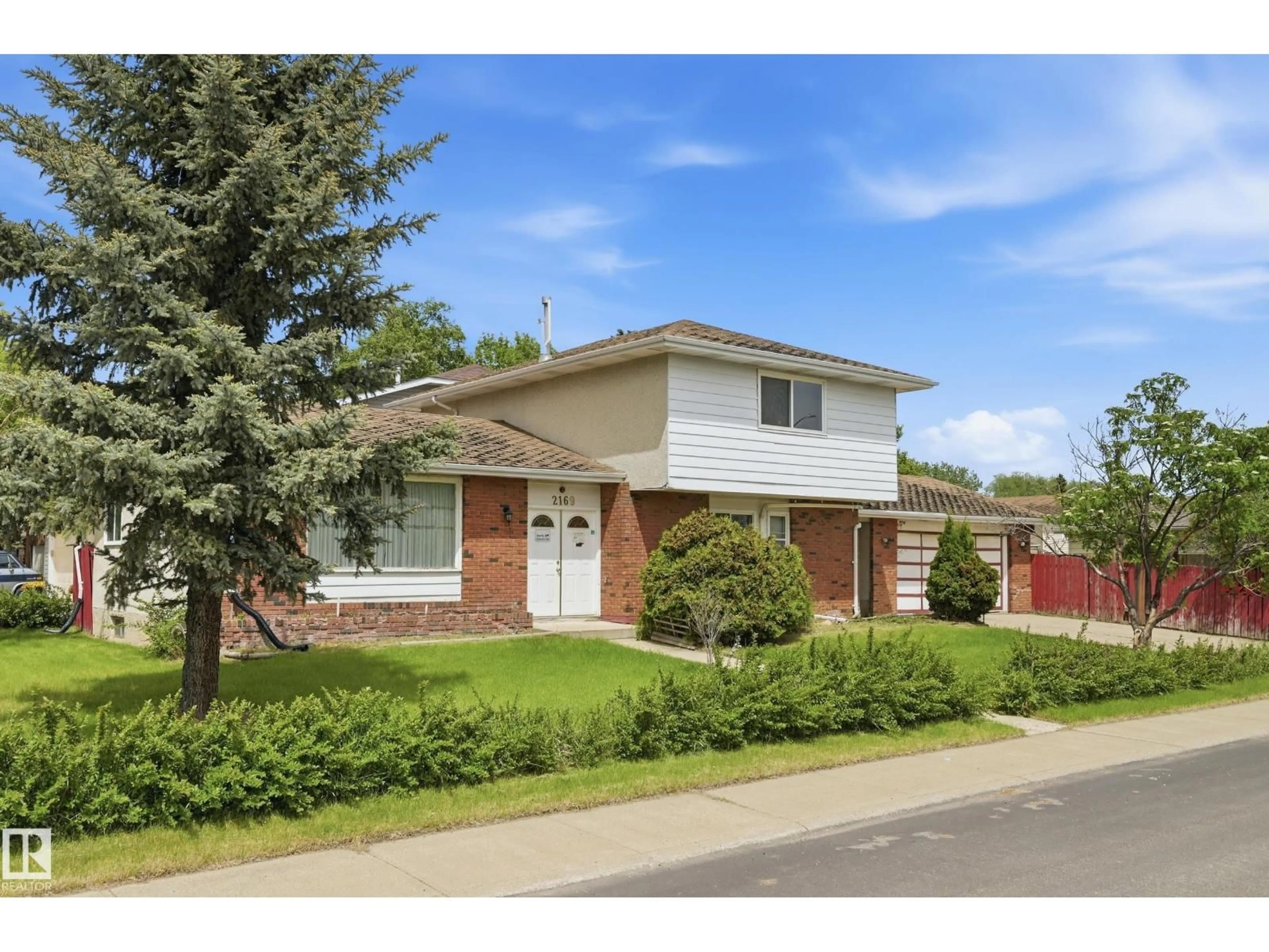 Home with brick exterior material, street for 2169 78 ST, Edmonton Alberta T6K2E4
