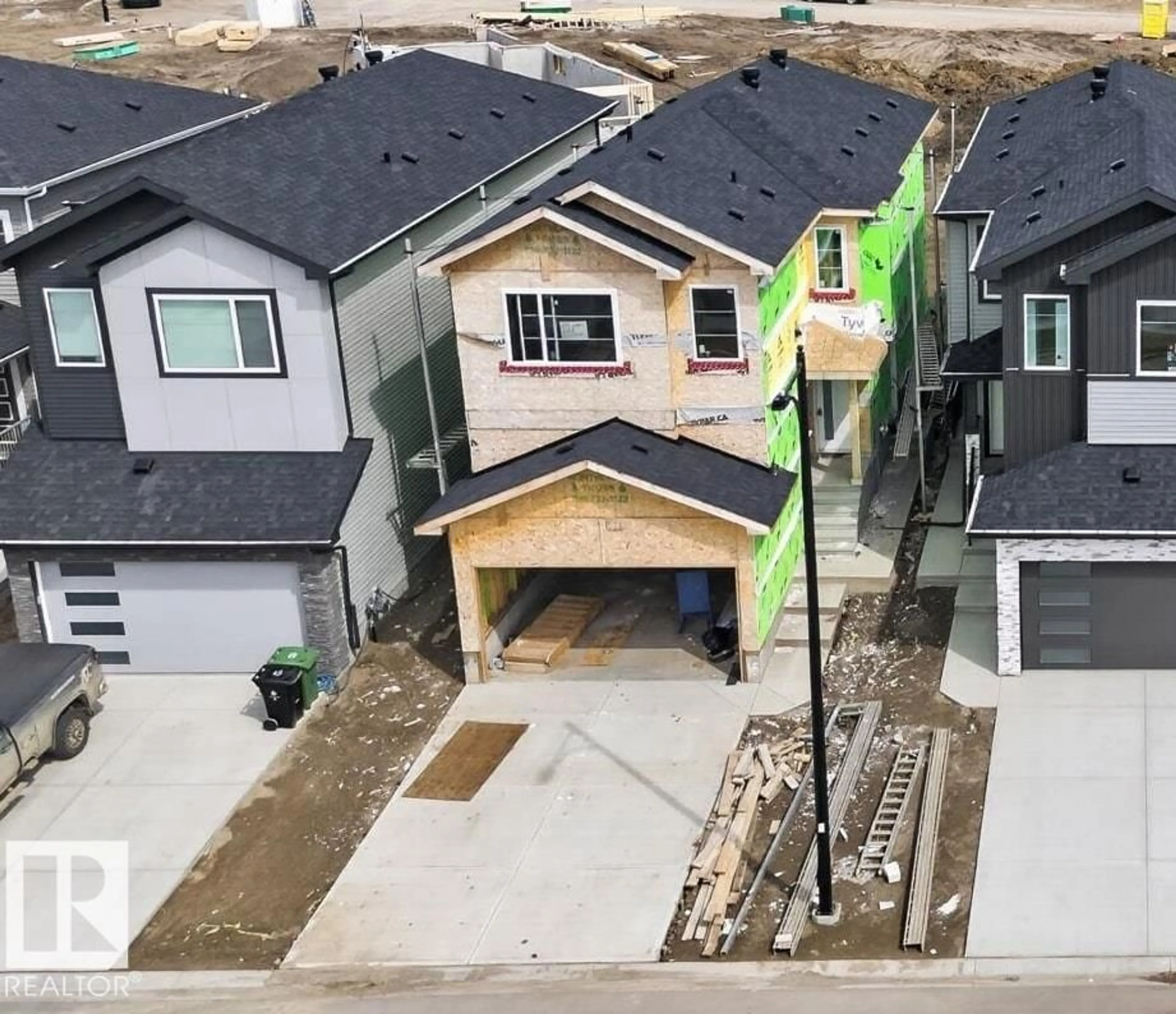 A pic from outside/outdoor area/front of a property/back of a property/a pic from drone, street for 105 WYATT RG, Fort Saskatchewan Alberta T8L0Y3