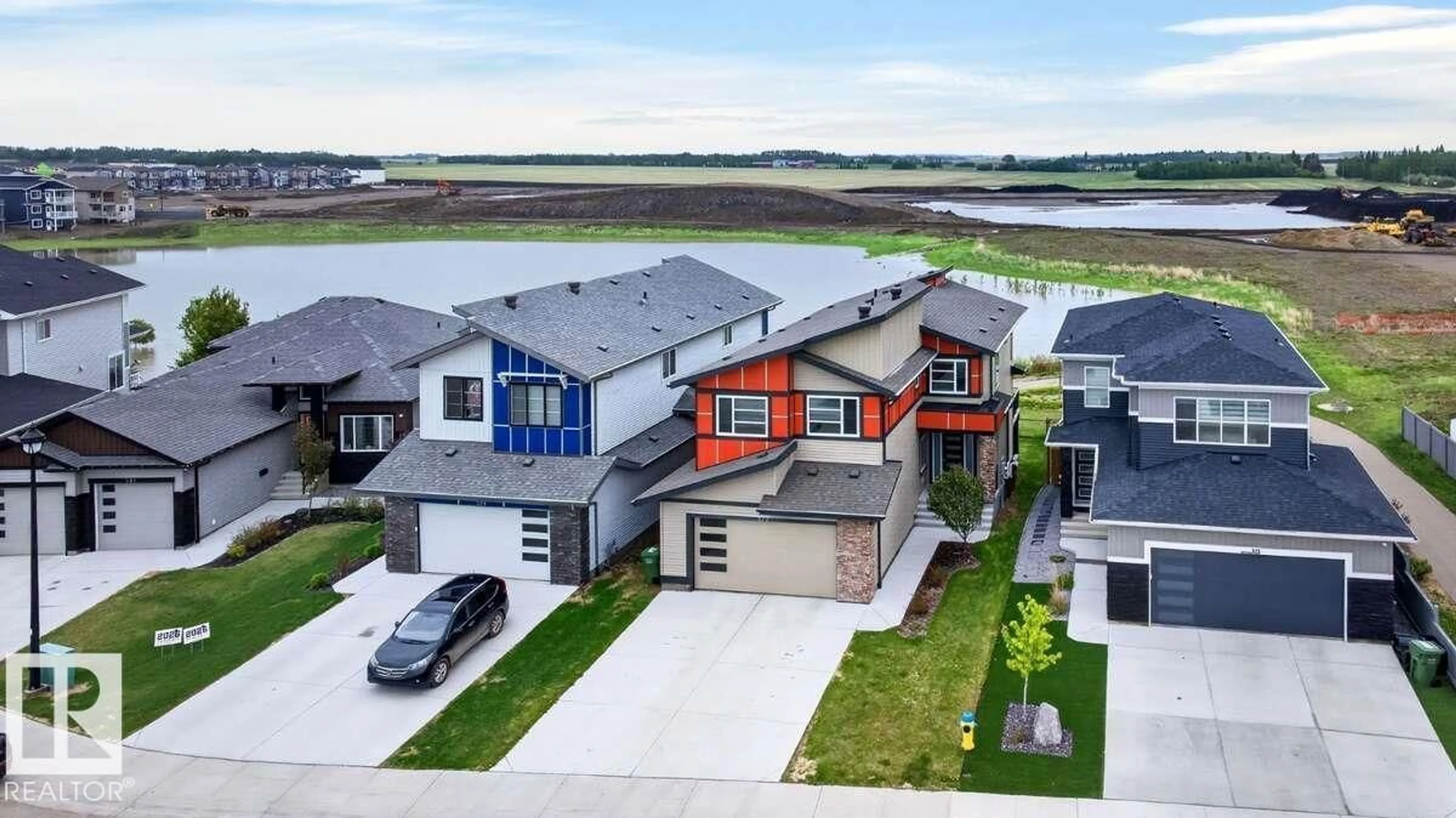 A pic from outside/outdoor area/front of a property/back of a property/a pic from drone, street for 577 BOULDER WD, Leduc Alberta T9E1M1