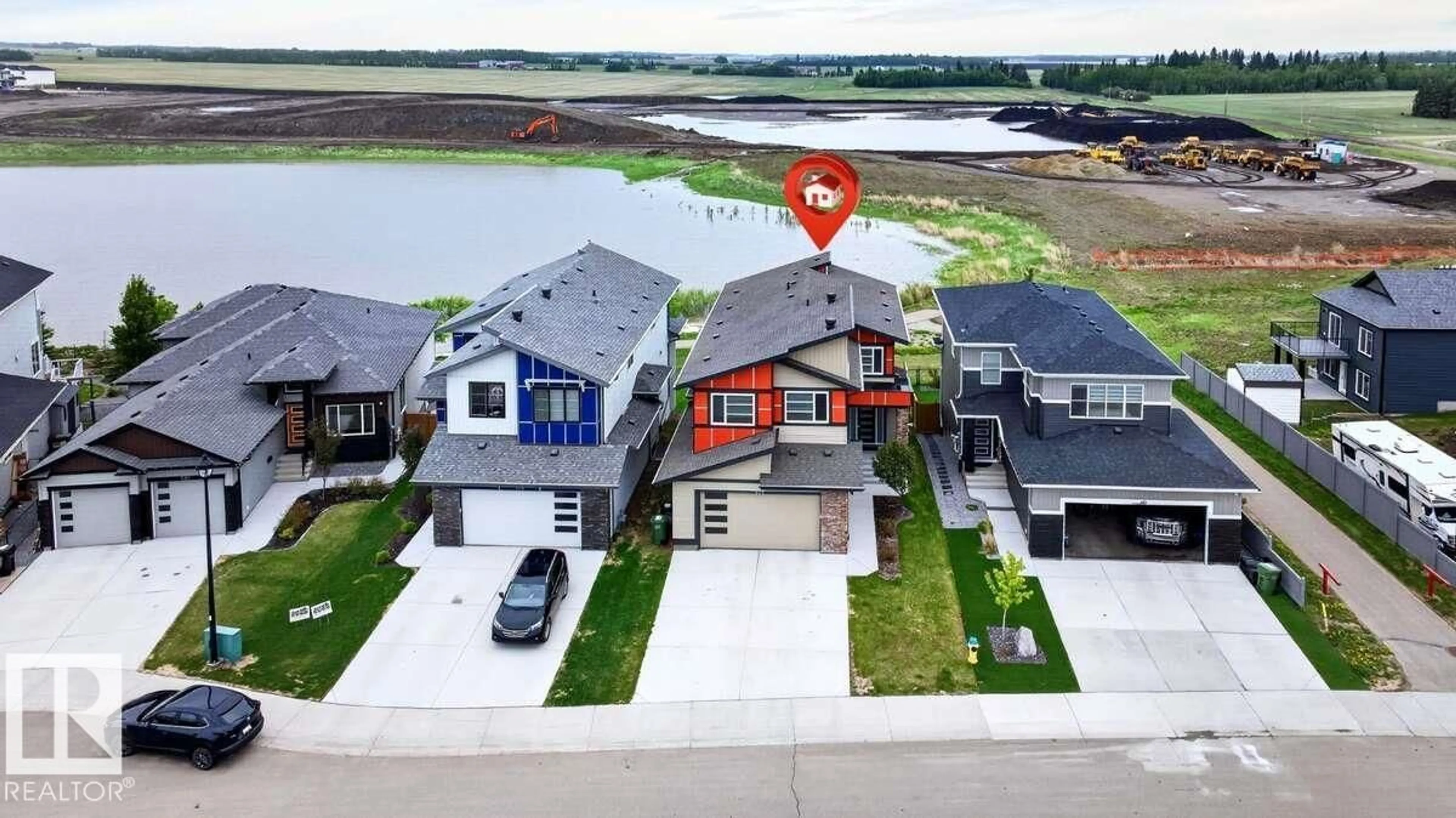 A pic from outside/outdoor area/front of a property/back of a property/a pic from drone, water/lake/river/ocean view for 577 BOULDER WD, Leduc Alberta T9E1M1