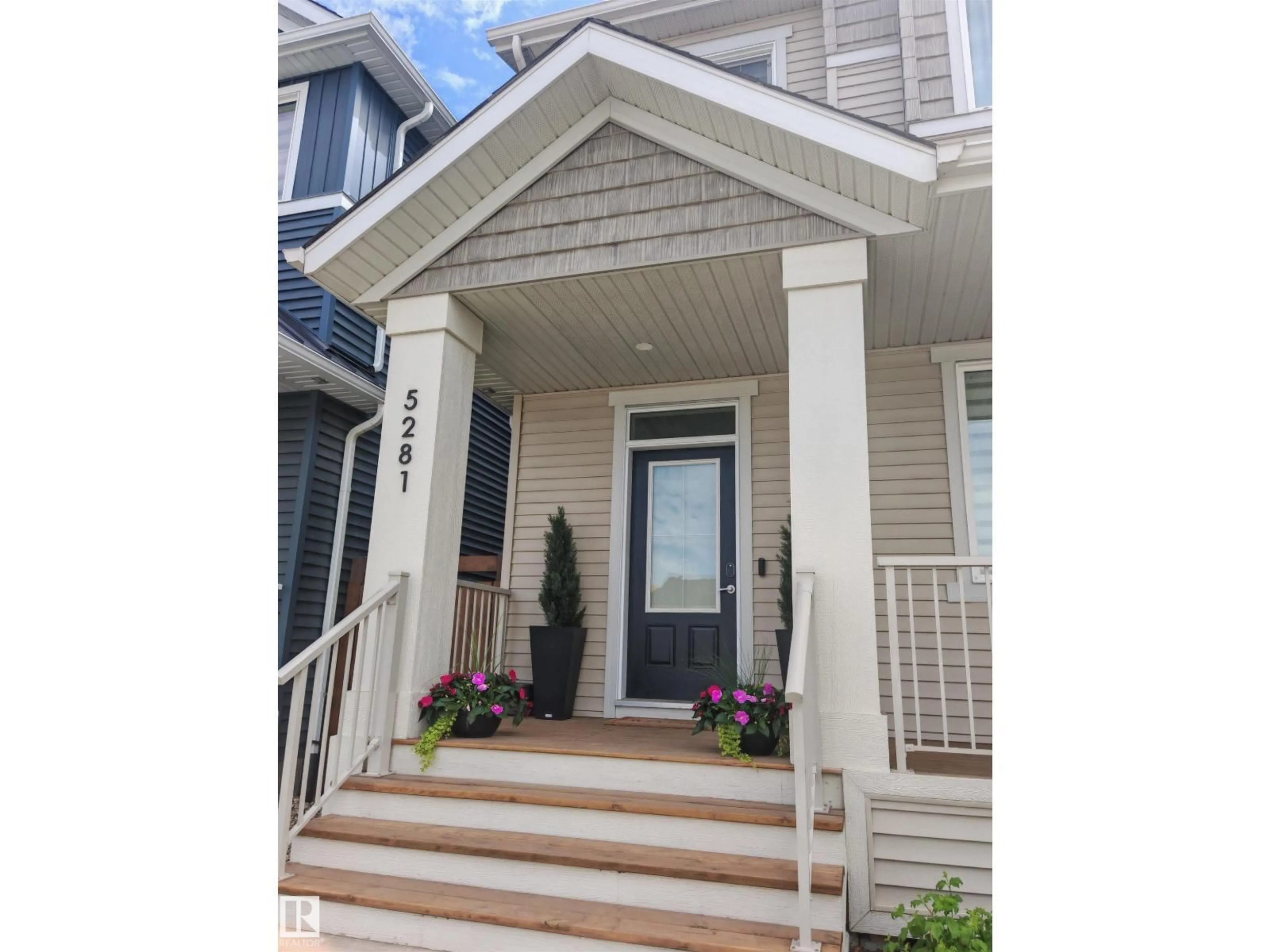 Home with vinyl exterior material, street for NW - 5271 EDGEMONT BV, Edmonton Alberta T6M1R8