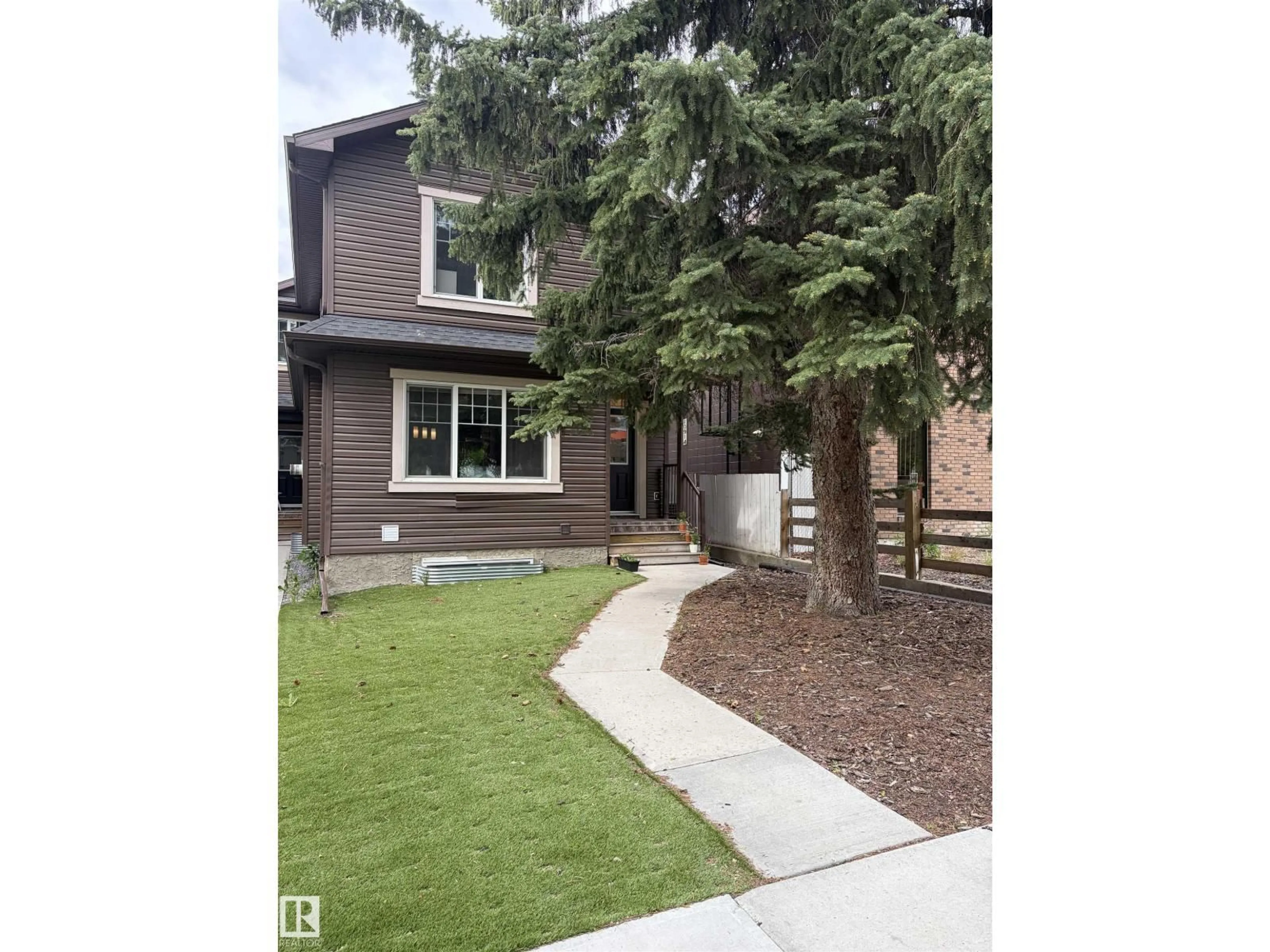 Home with brick exterior material, street for 10914 71 AV, Edmonton Alberta T6G0A1