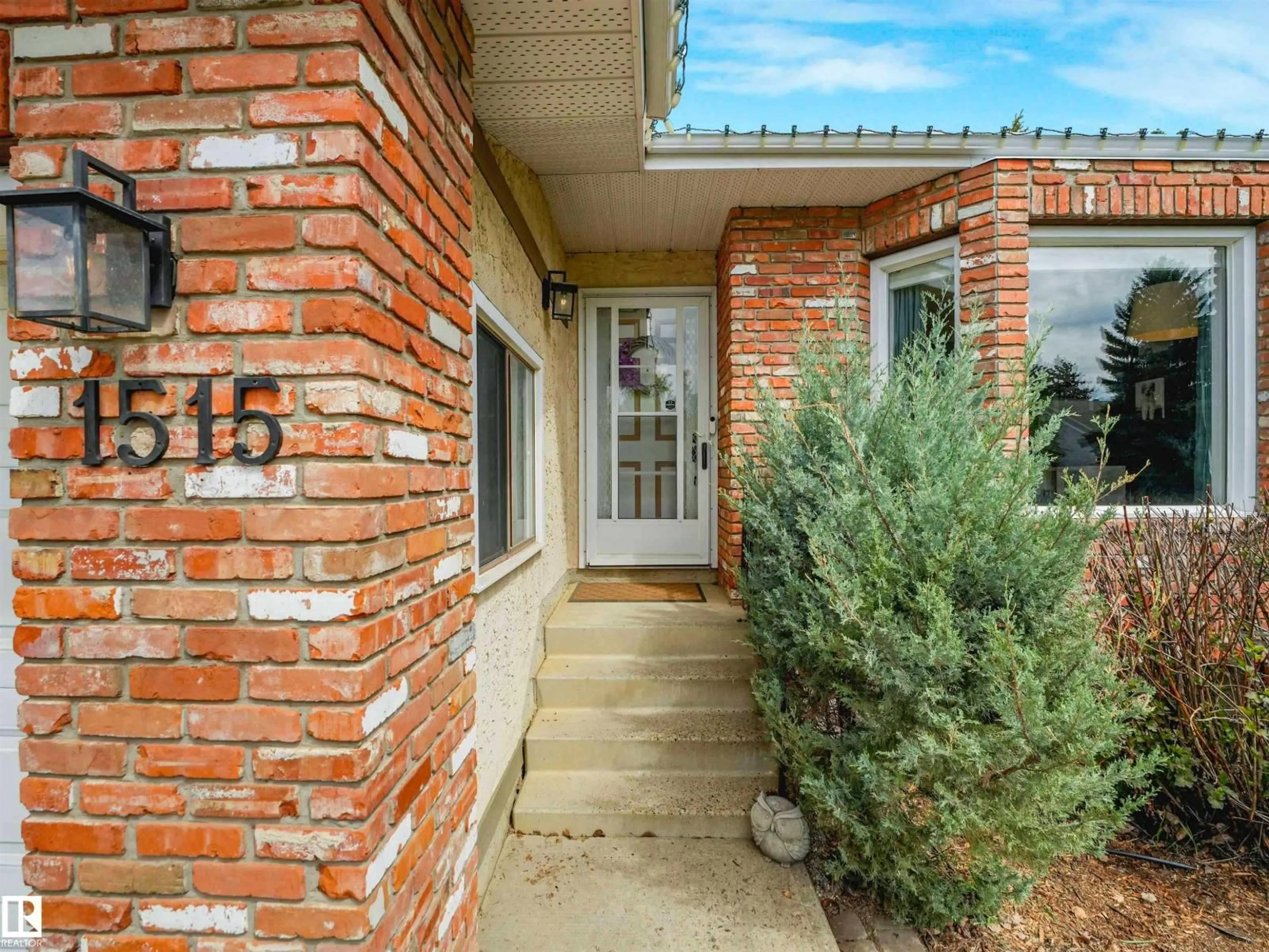 Home with brick exterior material, street for NW - 1515 109 ST, Edmonton Alberta T6J5W9