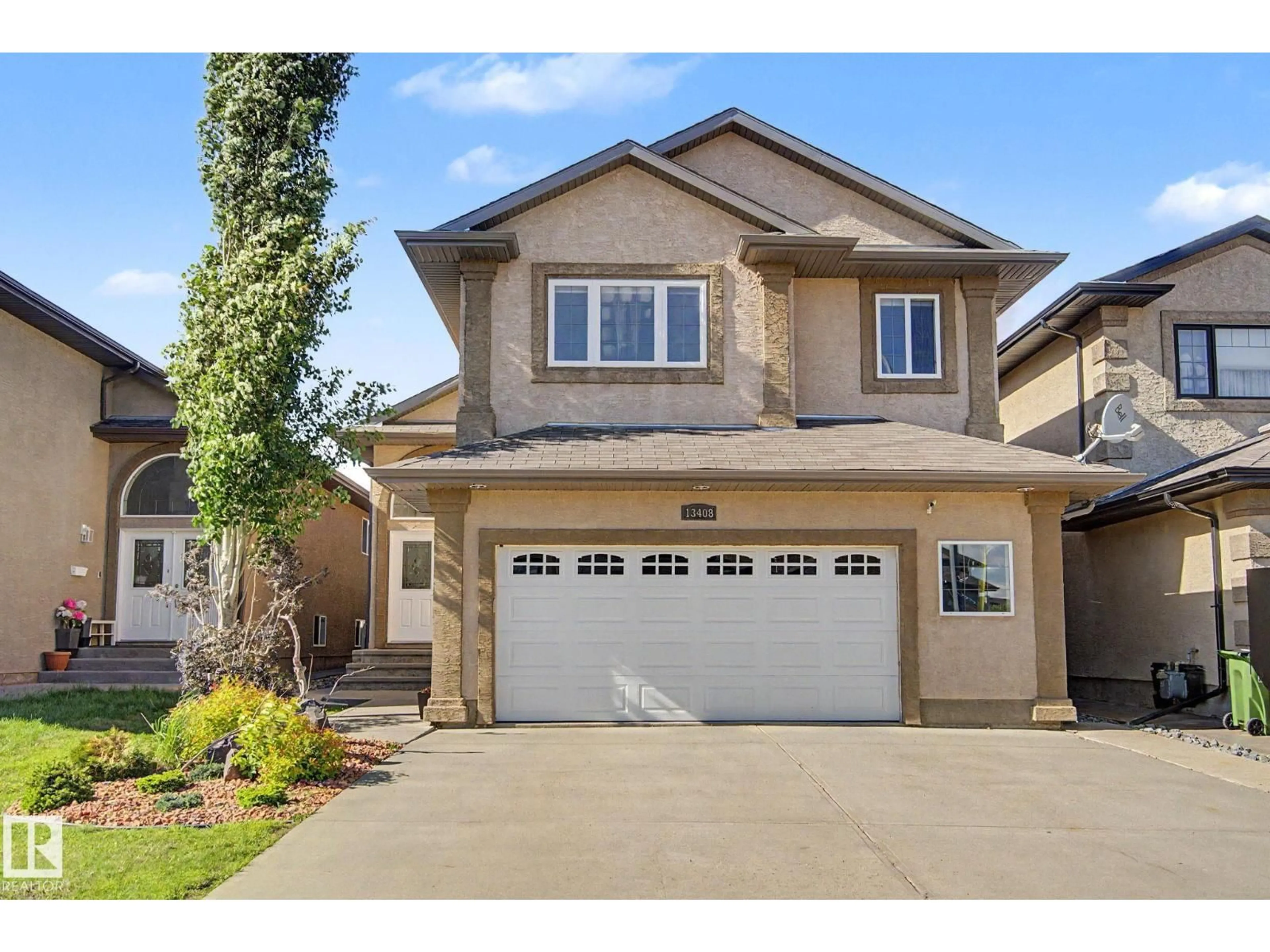 Home with vinyl exterior material, street for 13408 161 AV, Edmonton Alberta T6V0B9