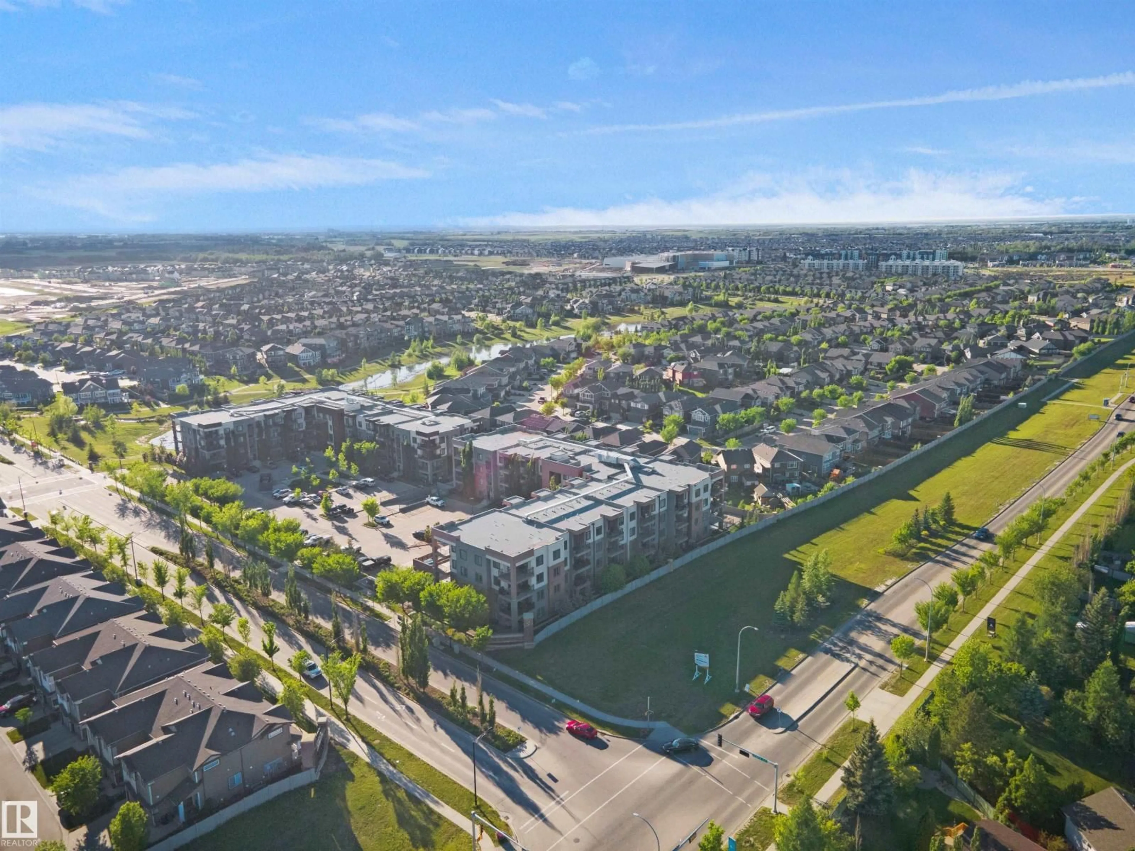 A pic from outside/outdoor area/front of a property/back of a property/a pic from drone, unknown for 318 - 1004 ROSENTHAL BV, Edmonton Alberta T5T7C6